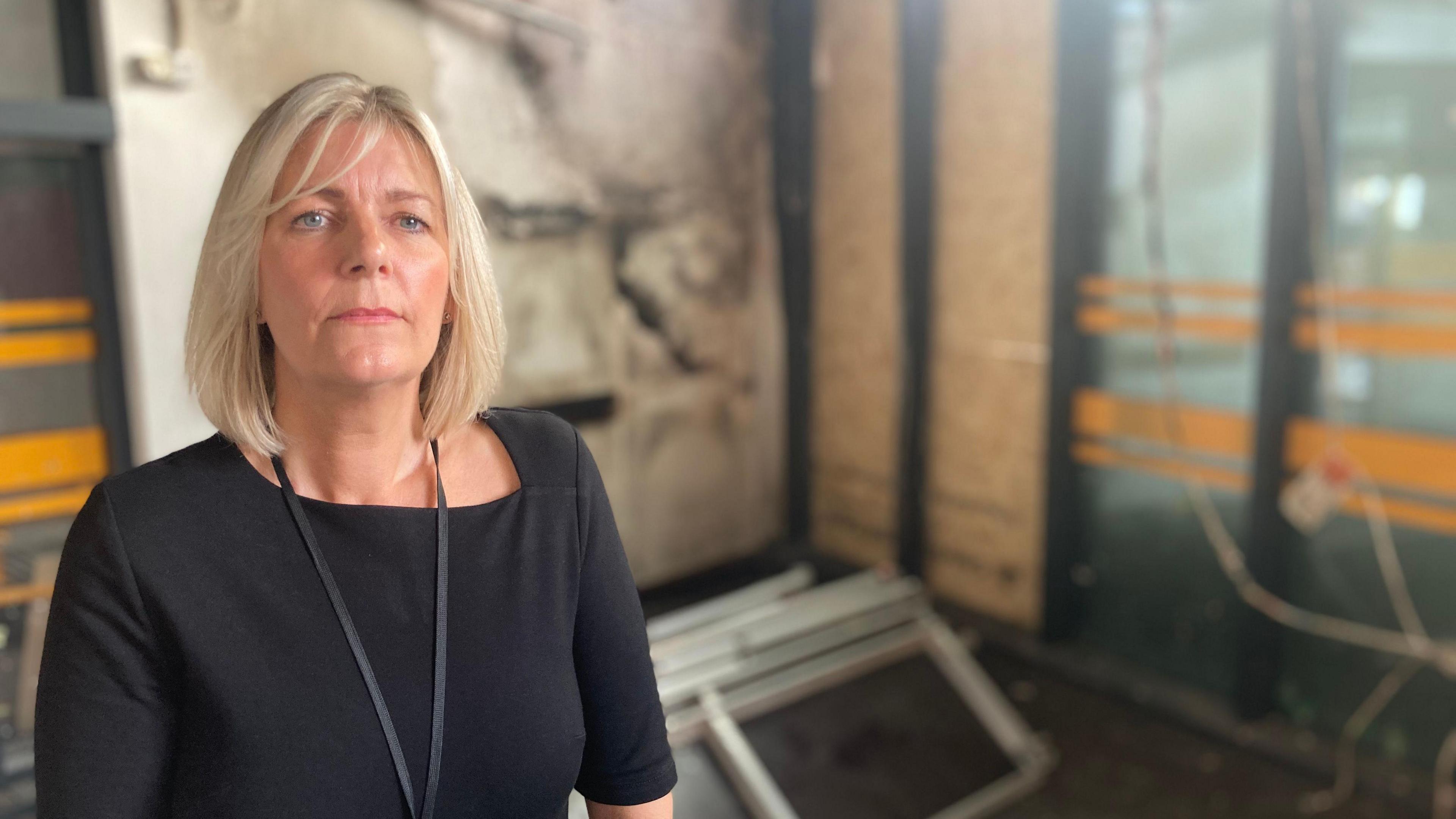 Library manager Deborah Moore in the damaged Spellow library