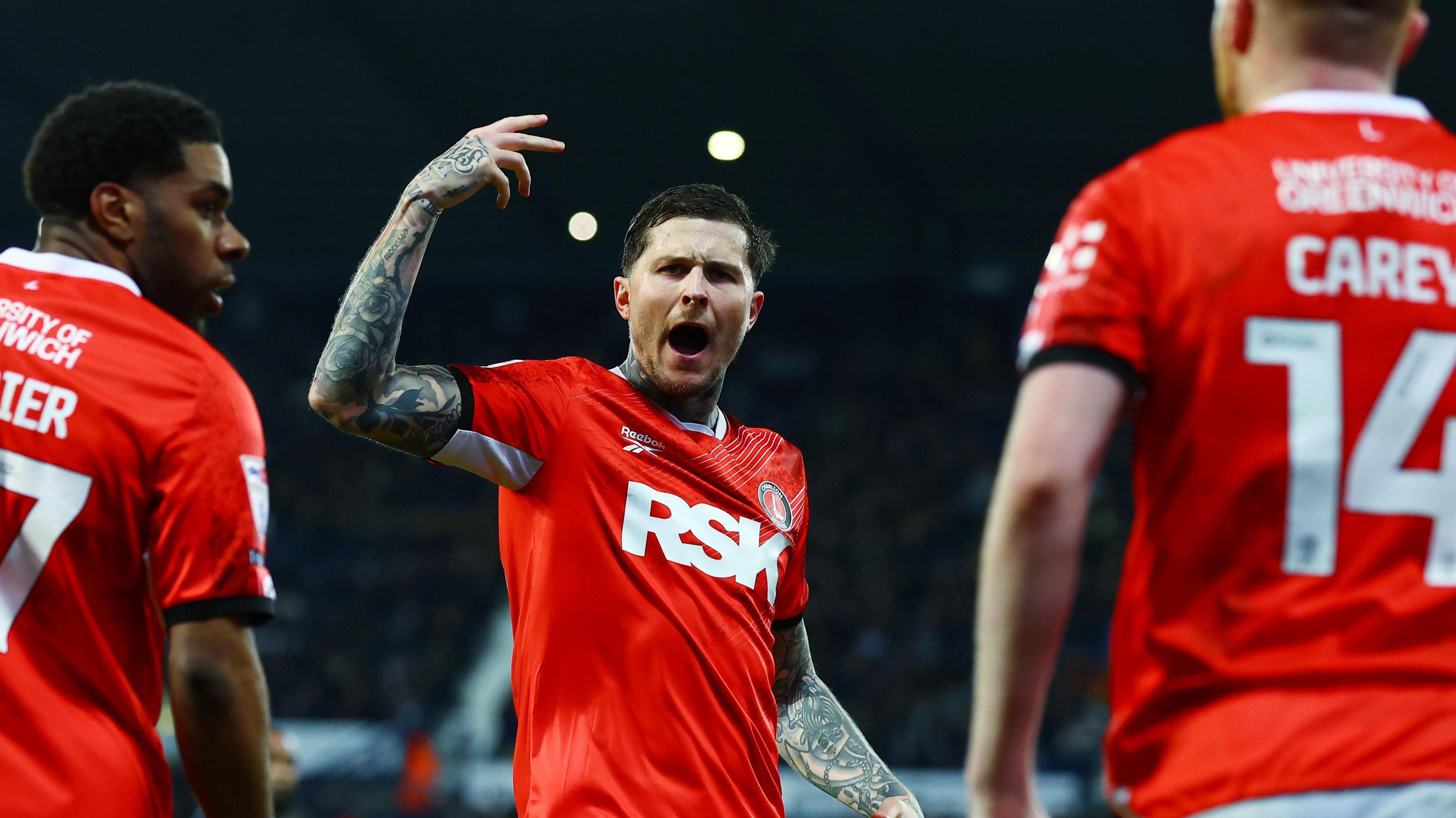 Charlton Athletic striker Lyndon Dykes celebrating after scoring the equaliser