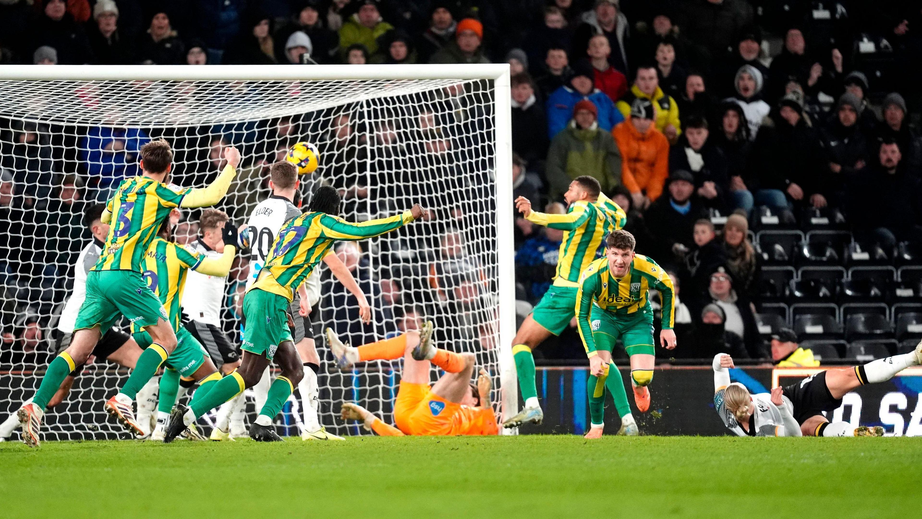 Chris Mepham (right) turns away to celebrate his equaliser for West Bromwich Albion against Derby