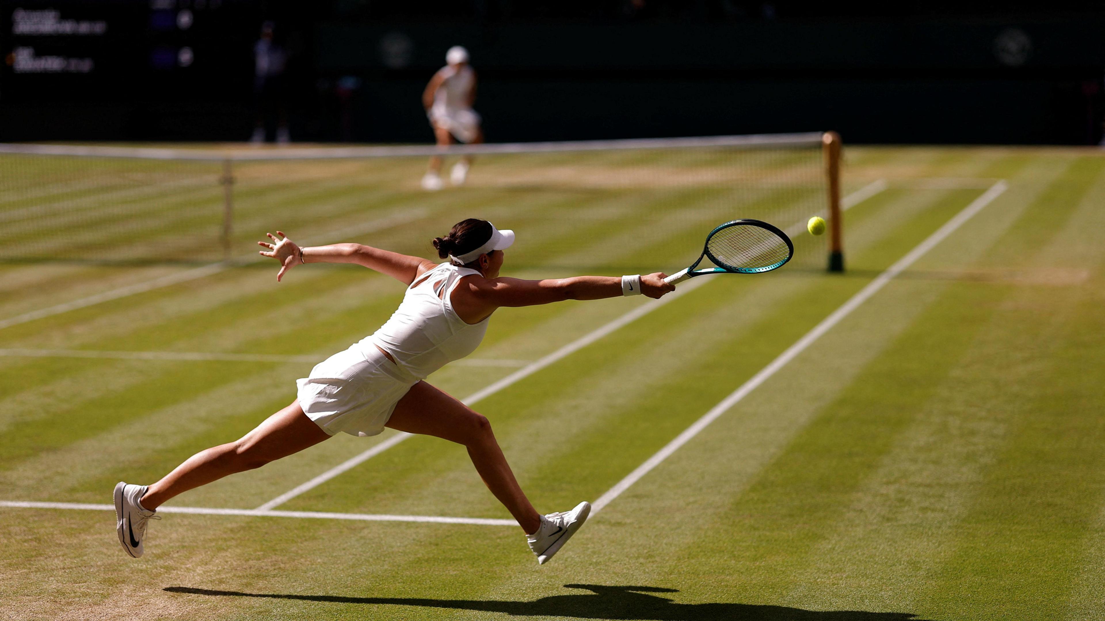 Amanda Anisimova of the US in action during the women's singles final against Poland's Iga Swiatek.