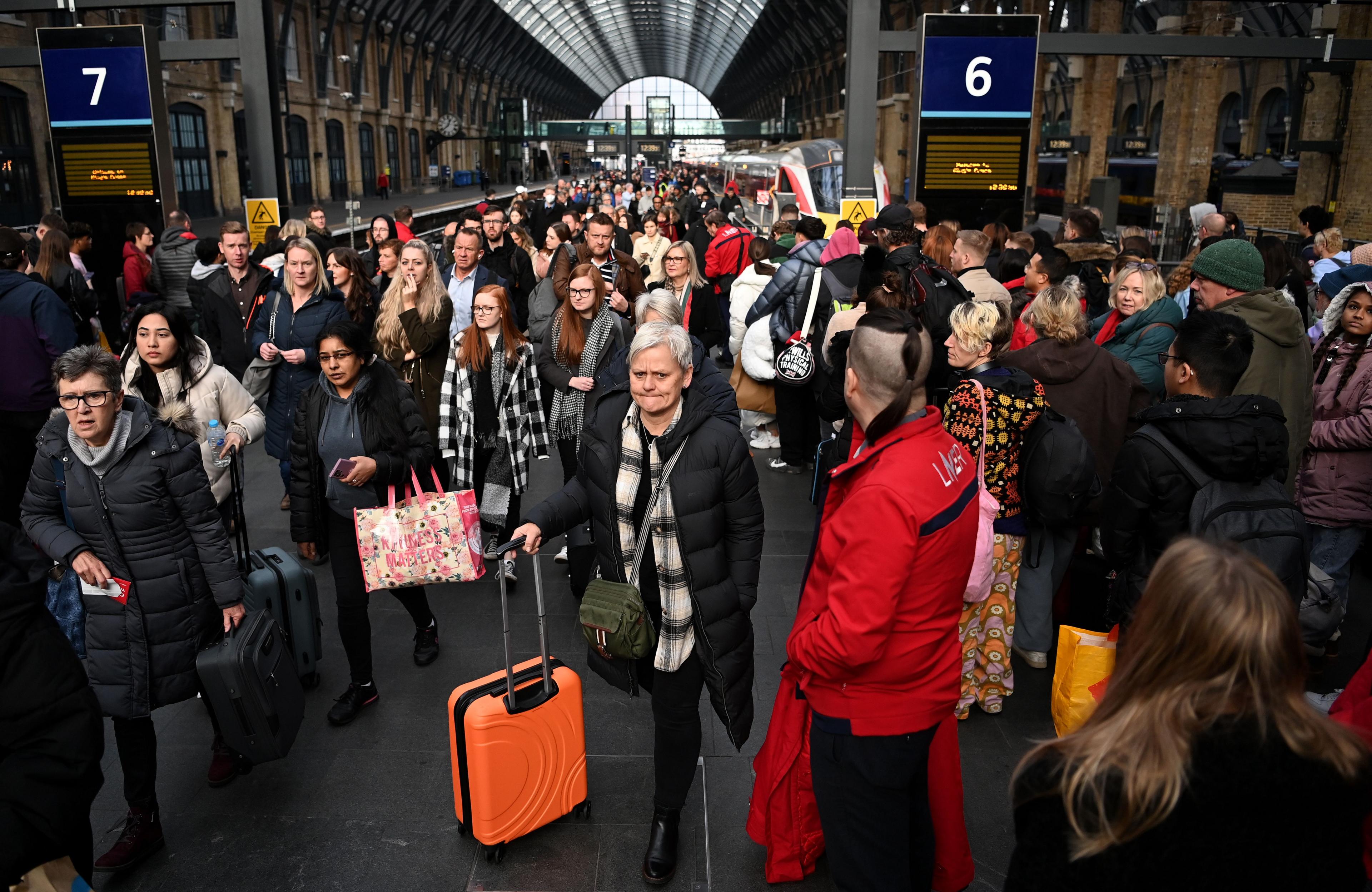 Travellers waiting for a train