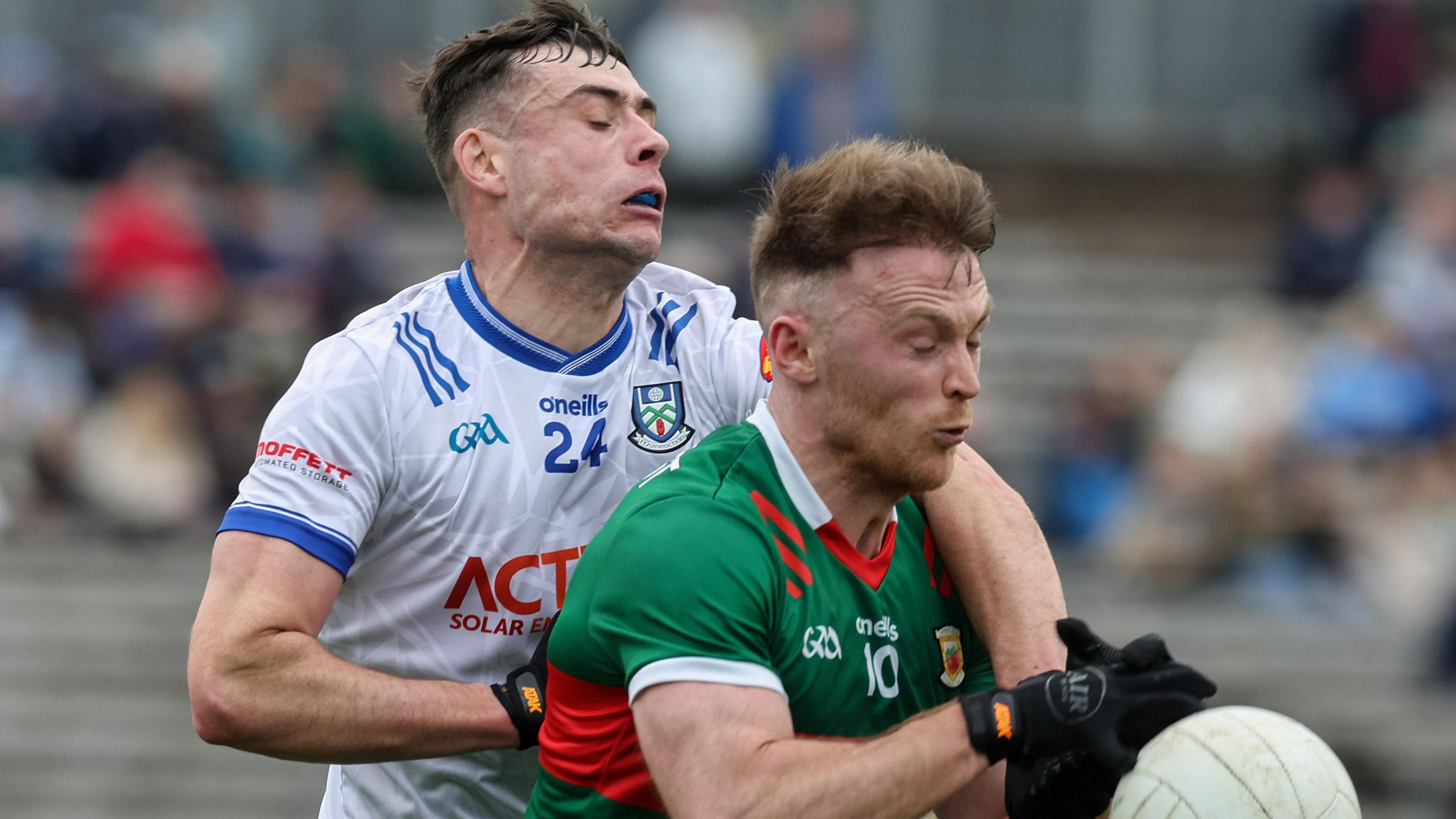 Monaghan's Barry McBennett (left) in action against Mayo during this year's Football League