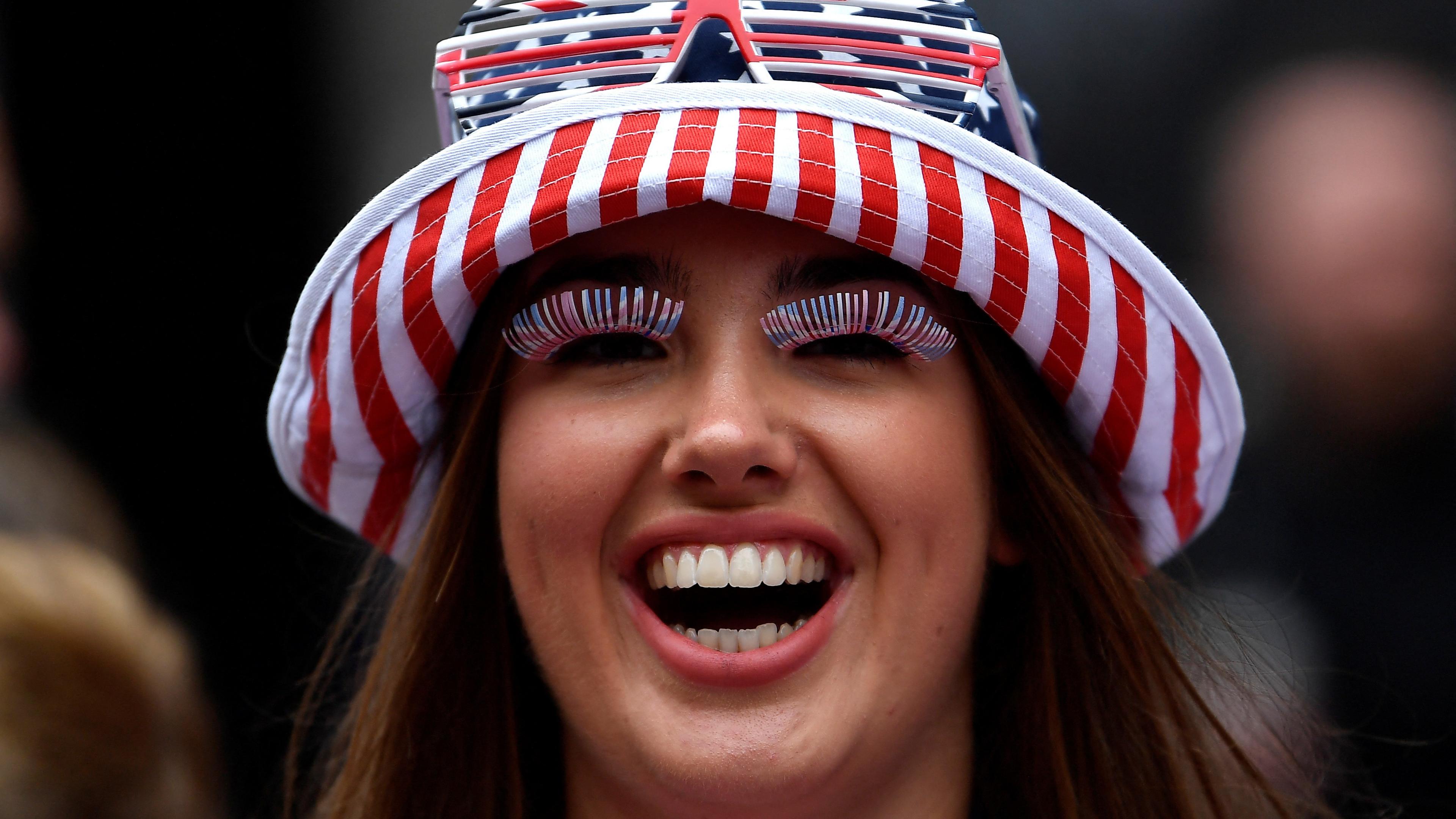 A woman watches the Twelfth of July Orange Order celebrations