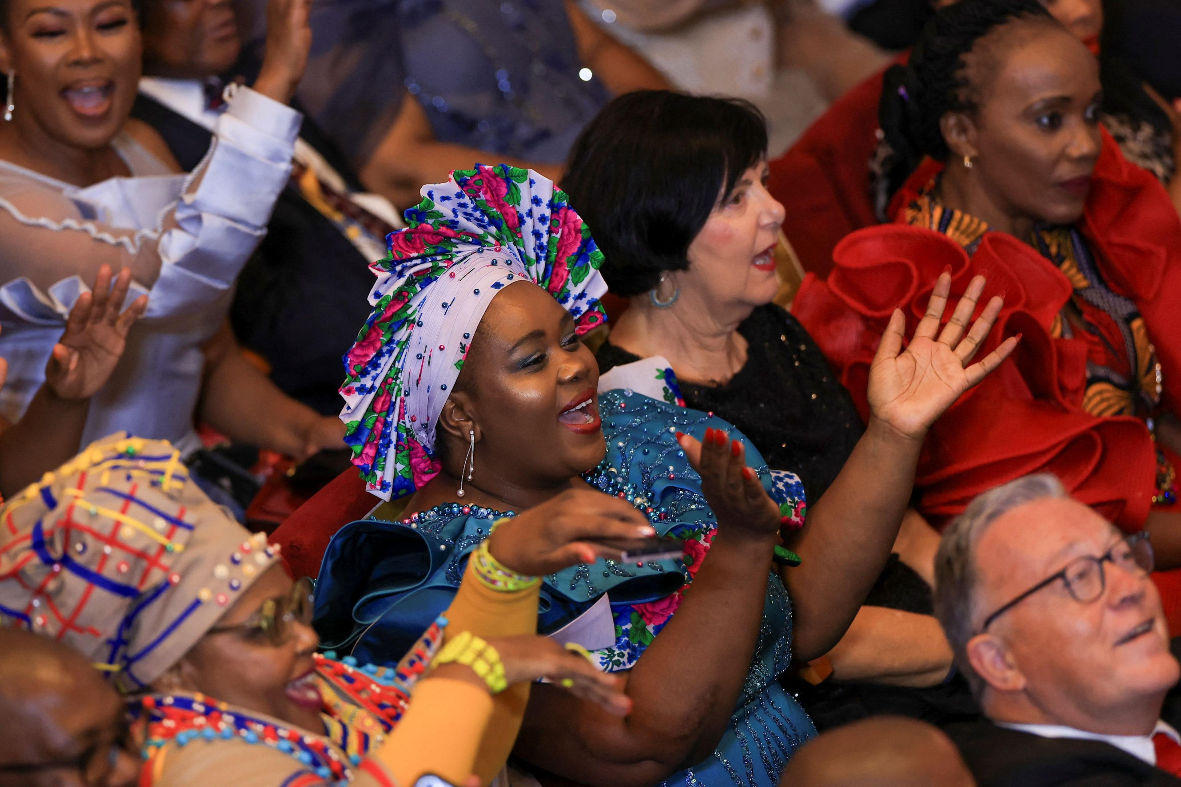 Members of parliament clap during the State of the Nation address in Cape Town, South Africa.