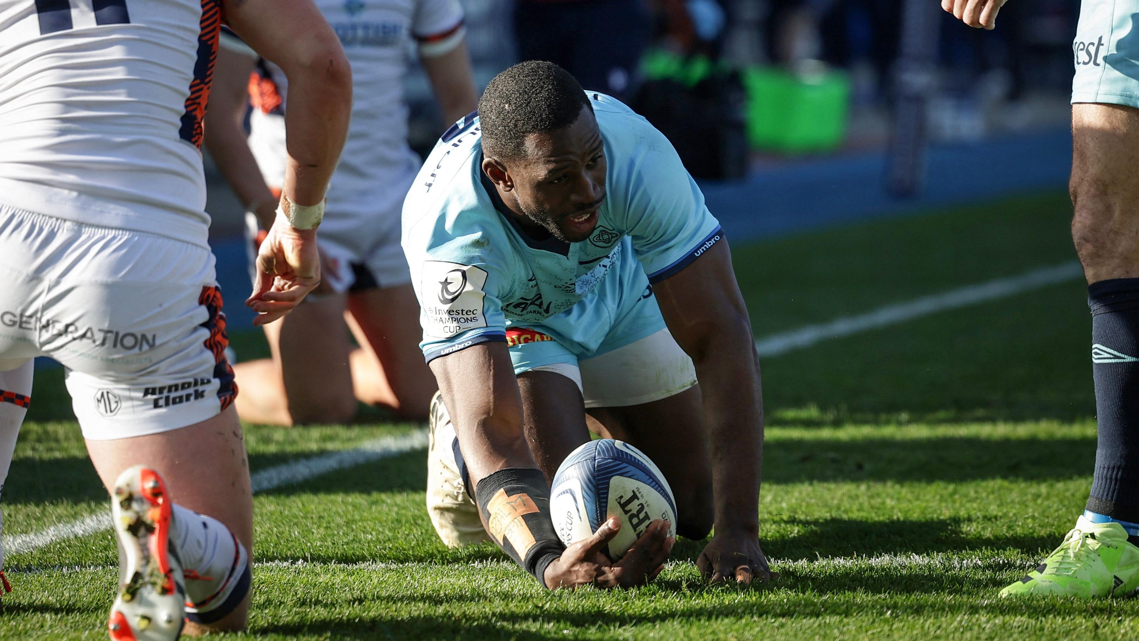 Christian Ambadiang celebrates after scoring