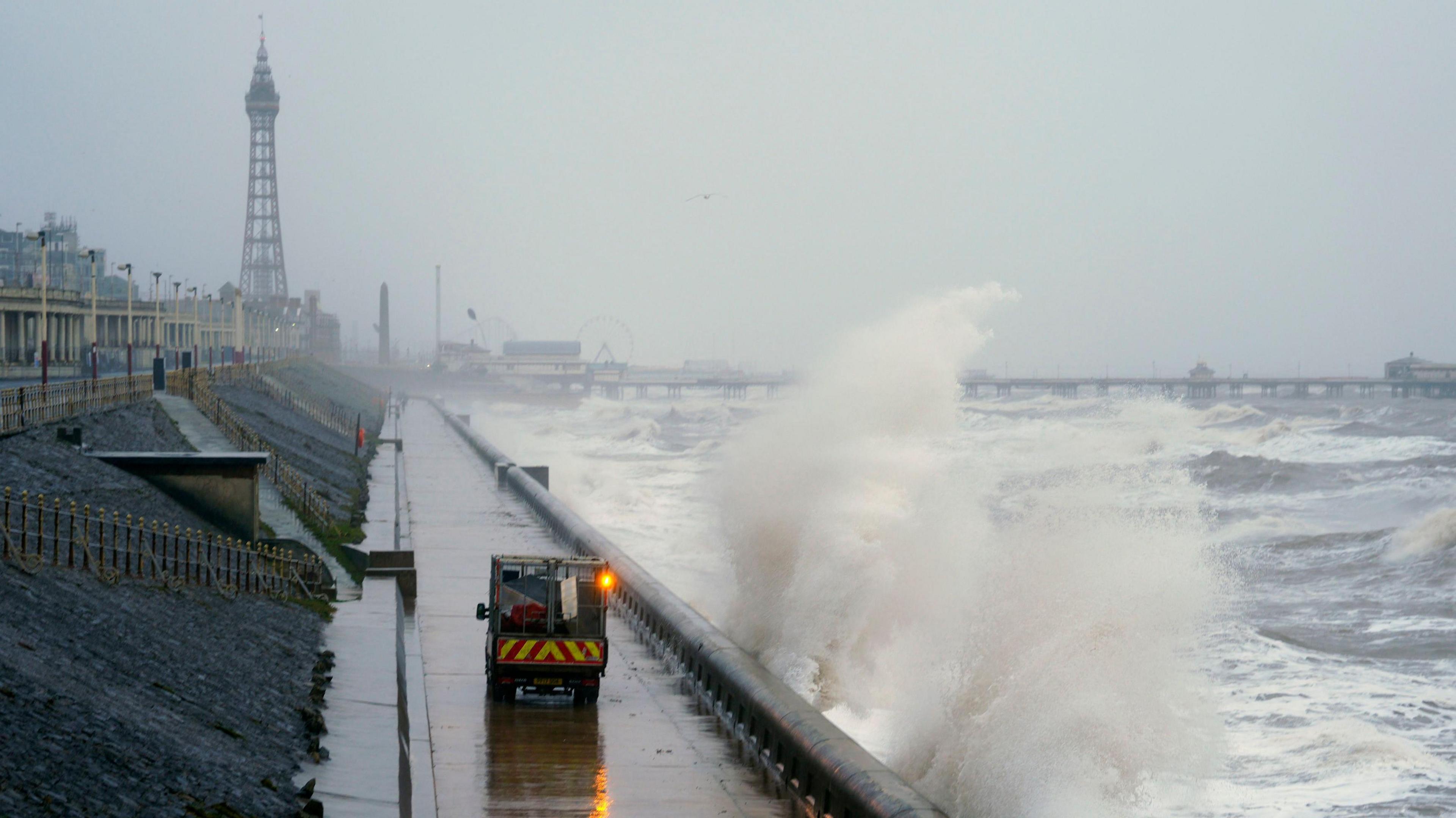 Waves break on the sea front in Blackpool