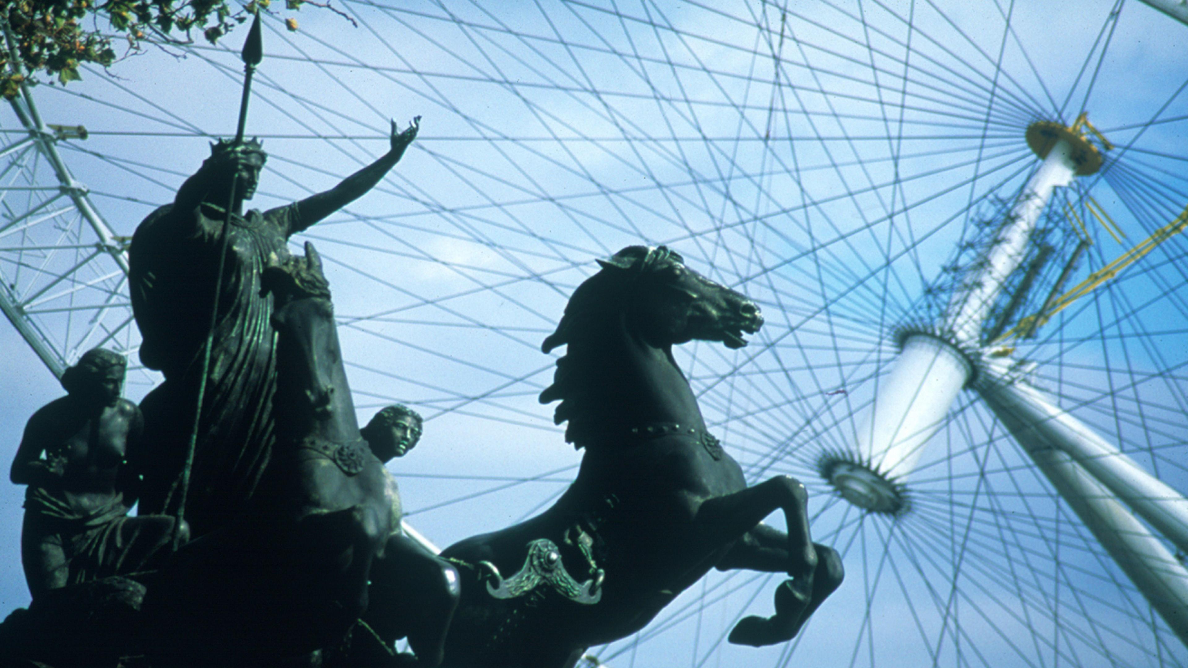 The statue of Boudicca in front of the wheel at 35 degrees as it was being put into place in London