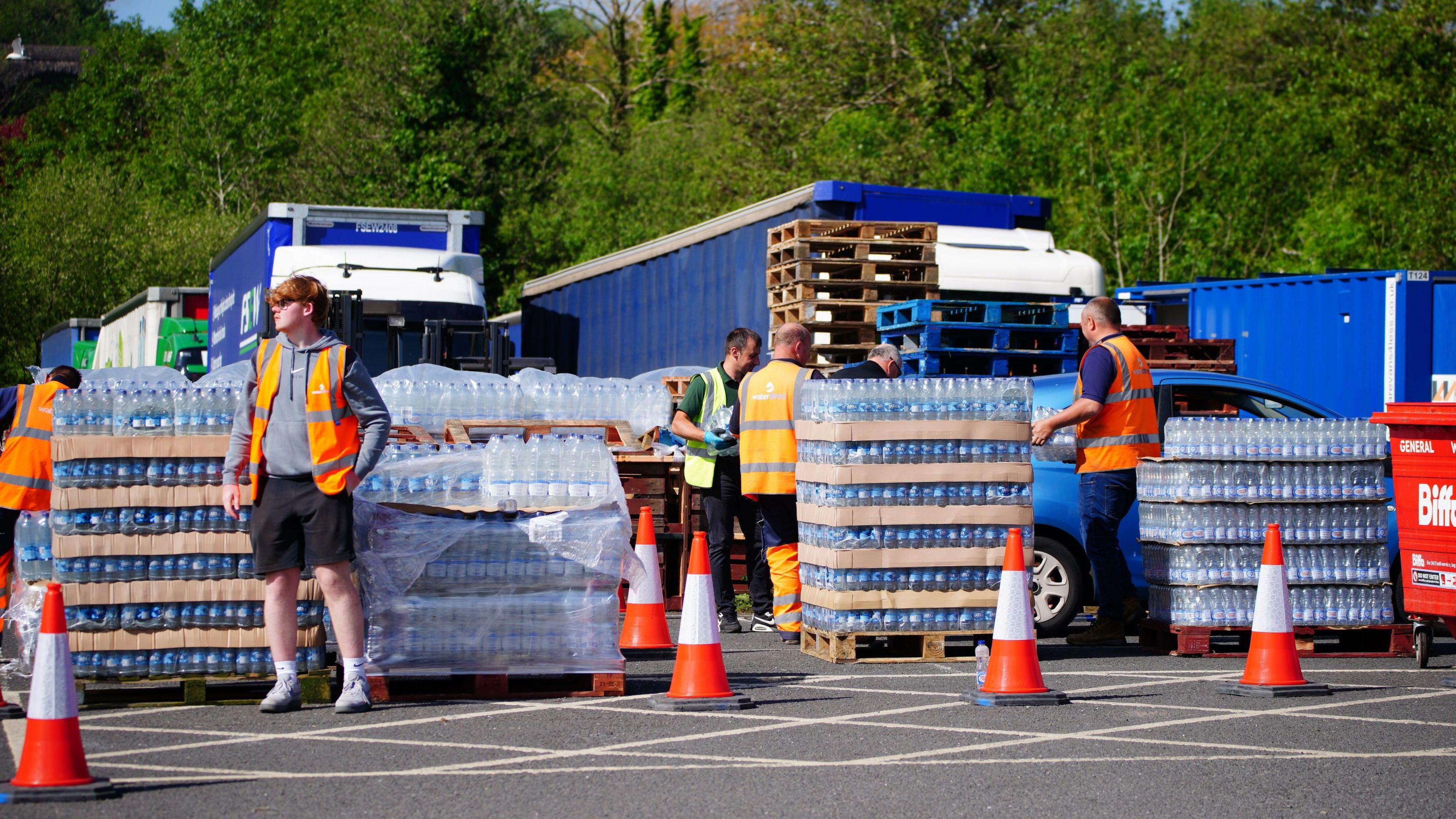 Bottled water being handed out