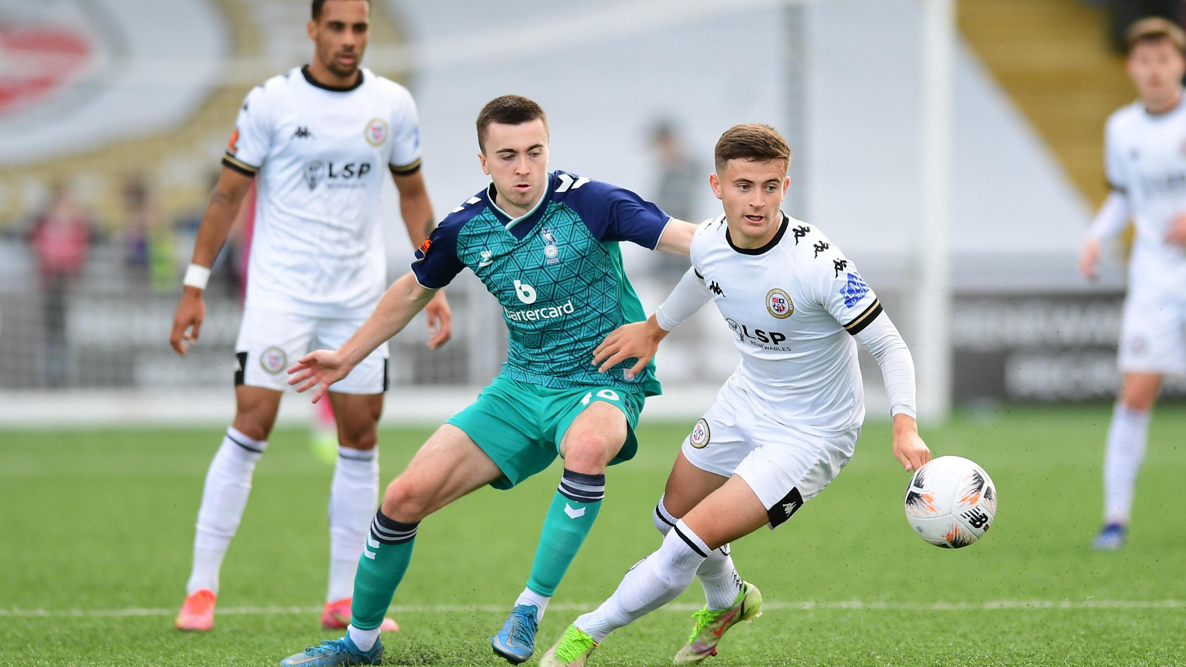 James Vennings of Bromley in possession ahead of Luke Burgess of Oldham Athletic