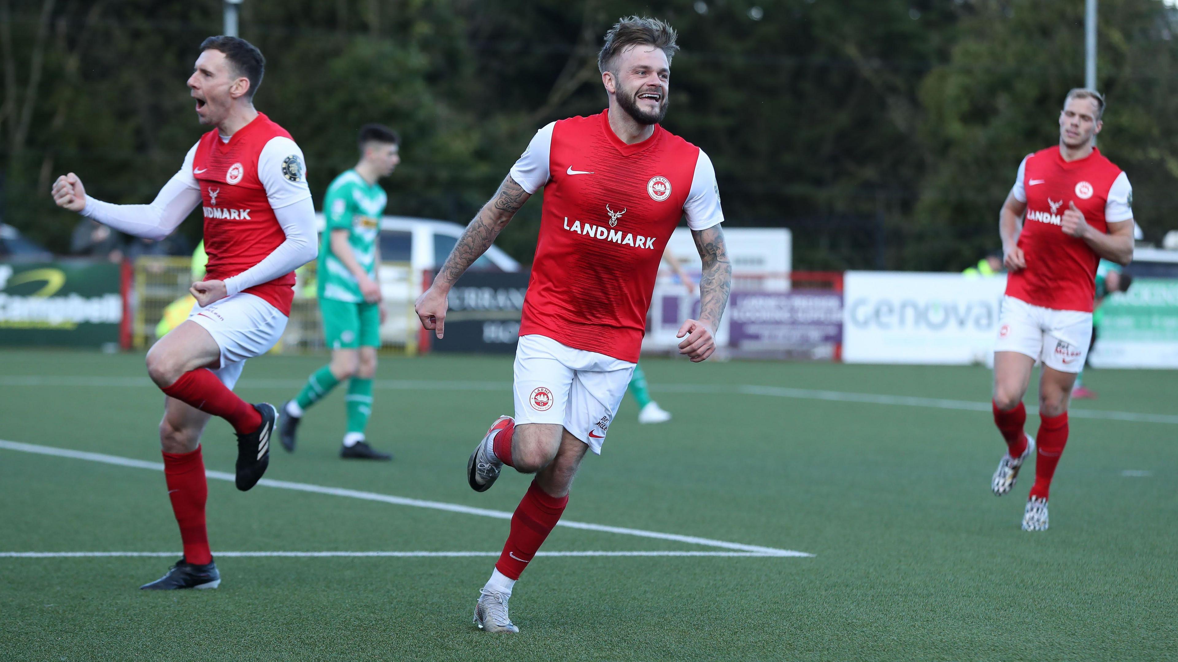 Andy Ryan celebrates a goal against Cliftonville