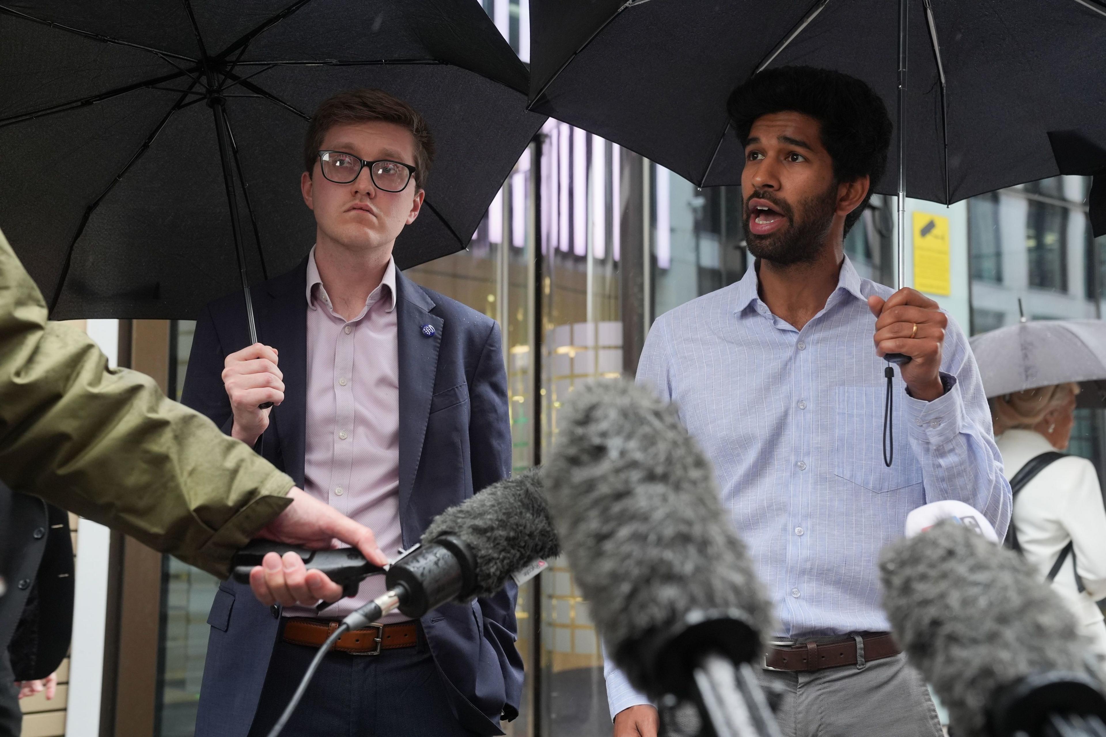 Dr Robert Laurenson  (left), co-chair of the British Medical Association's junior doctors' committee and Vivek Trivedi (right), the co-chair of the junior doctors' committee, speak to the media after leaving the Department for Health in central London, following a meeting with Health Secretary Wes Streeting to discuss their pay dispute