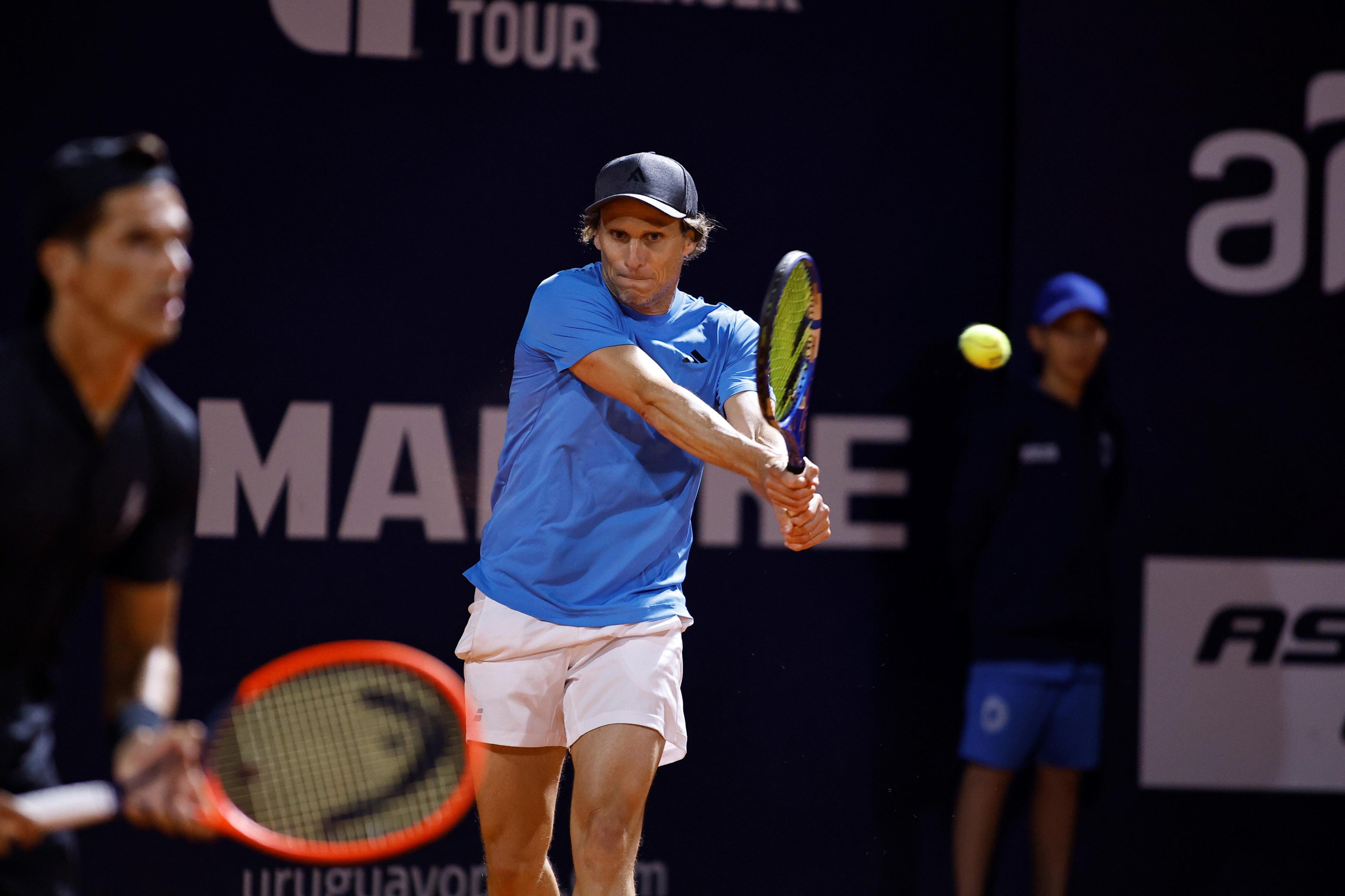 Diego Forlan plays a backhand