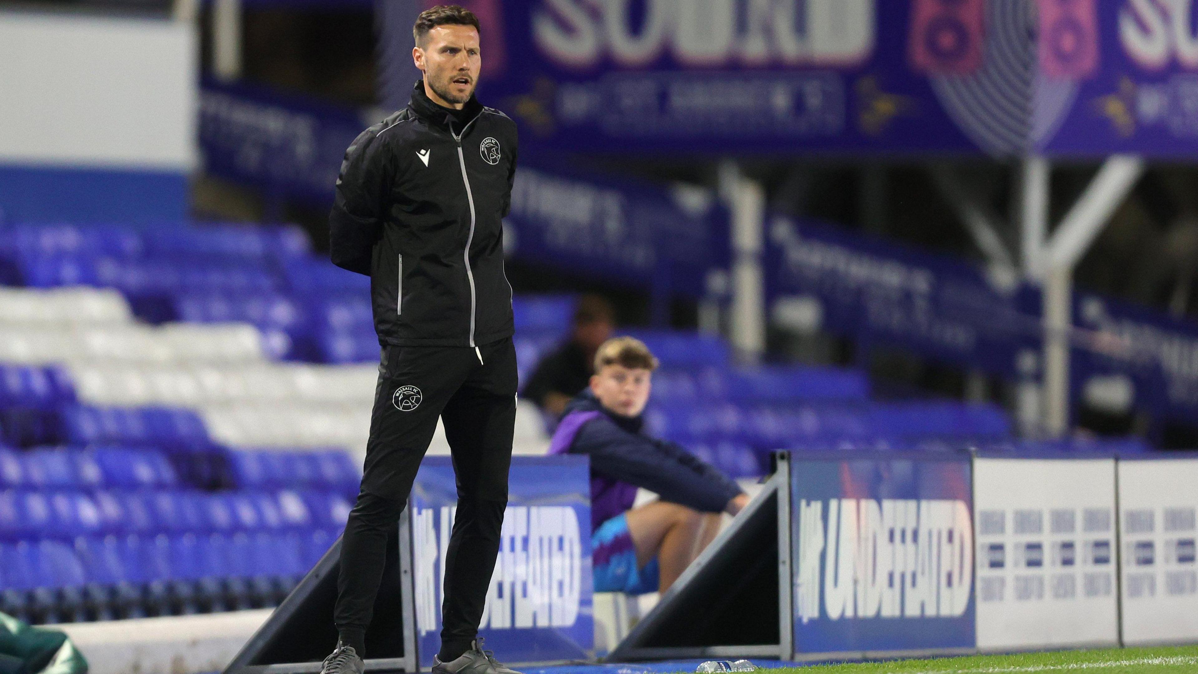 Walsall manager Mat Sadler on the touchline