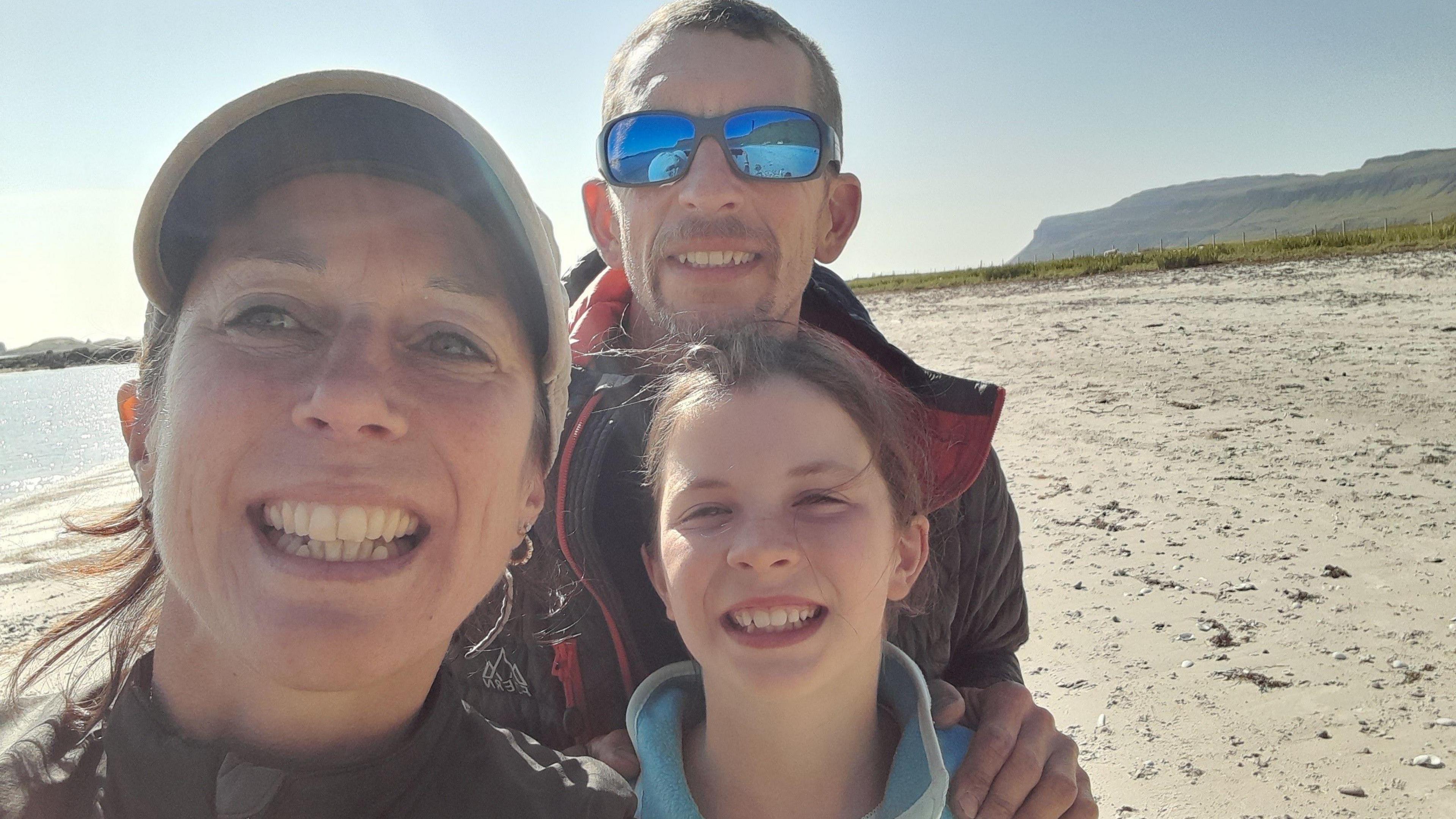 Jane Reedy with husband Matt and daughter Tess