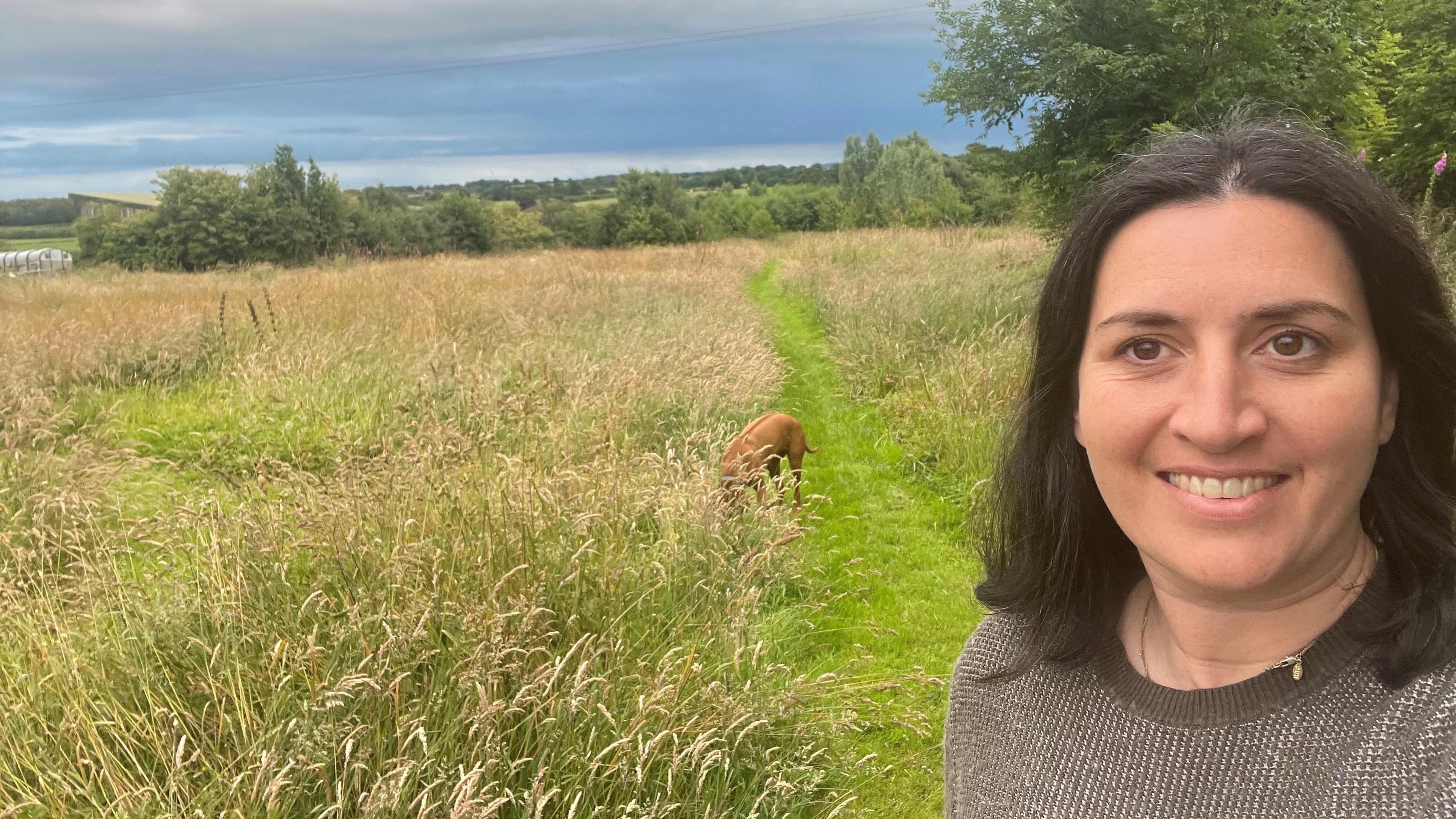 Emma Porter posing in the Cumbrian countryside