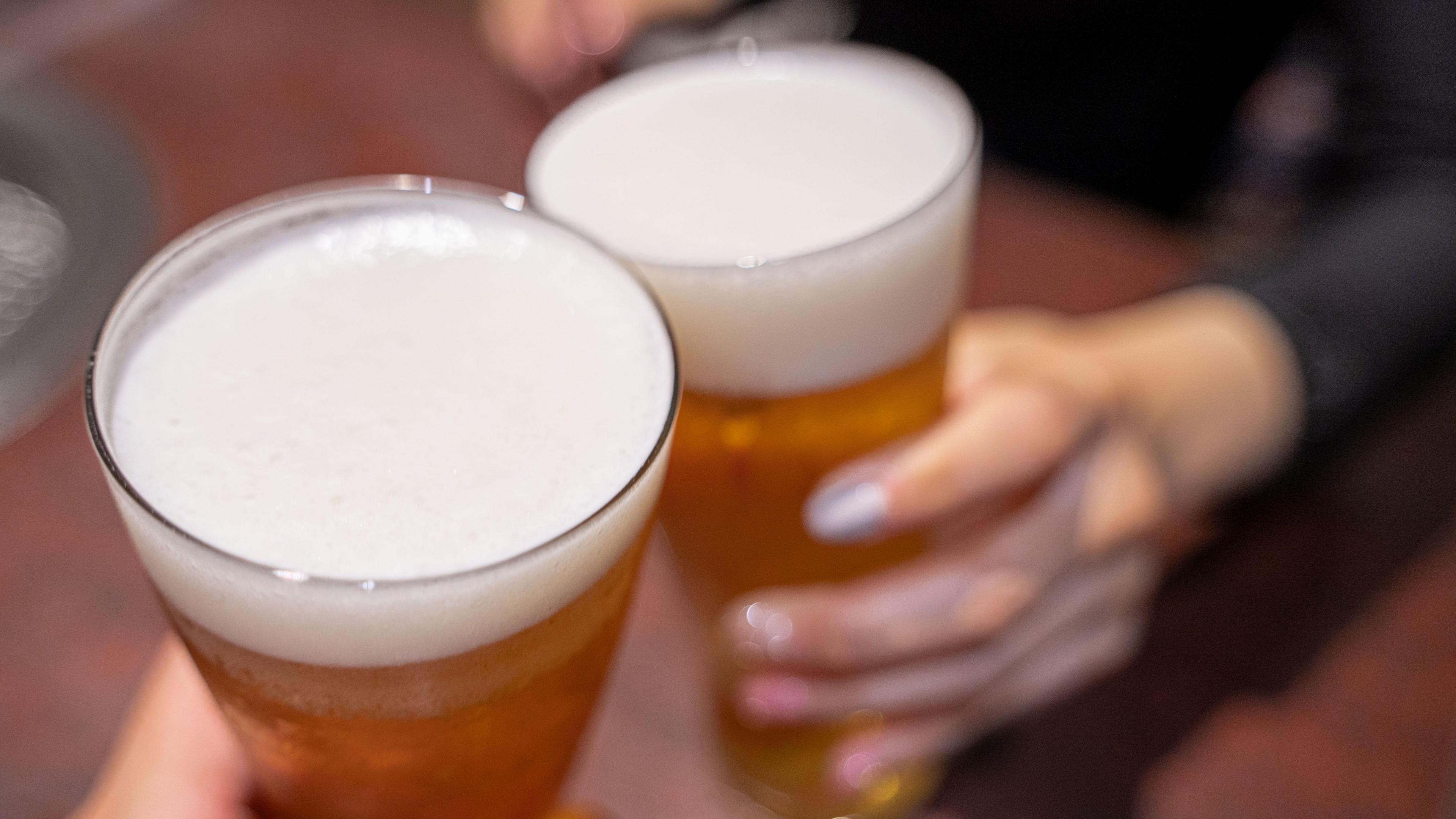 Two pints of beer, seen from above