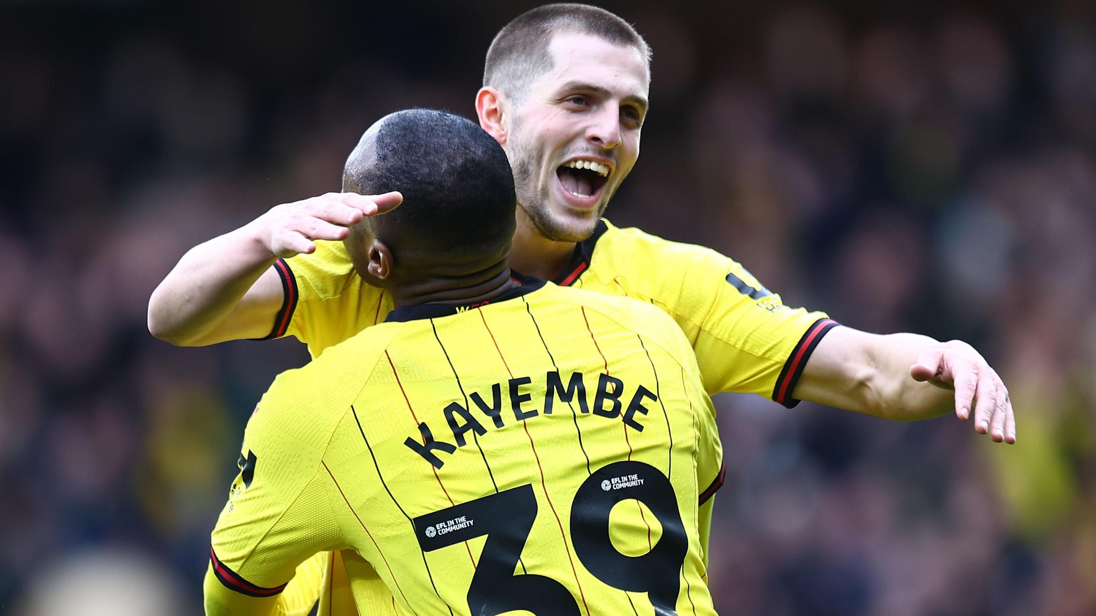 Giorgi Chakvetadze celebrates with Watford team-mate Edo Kayembe
