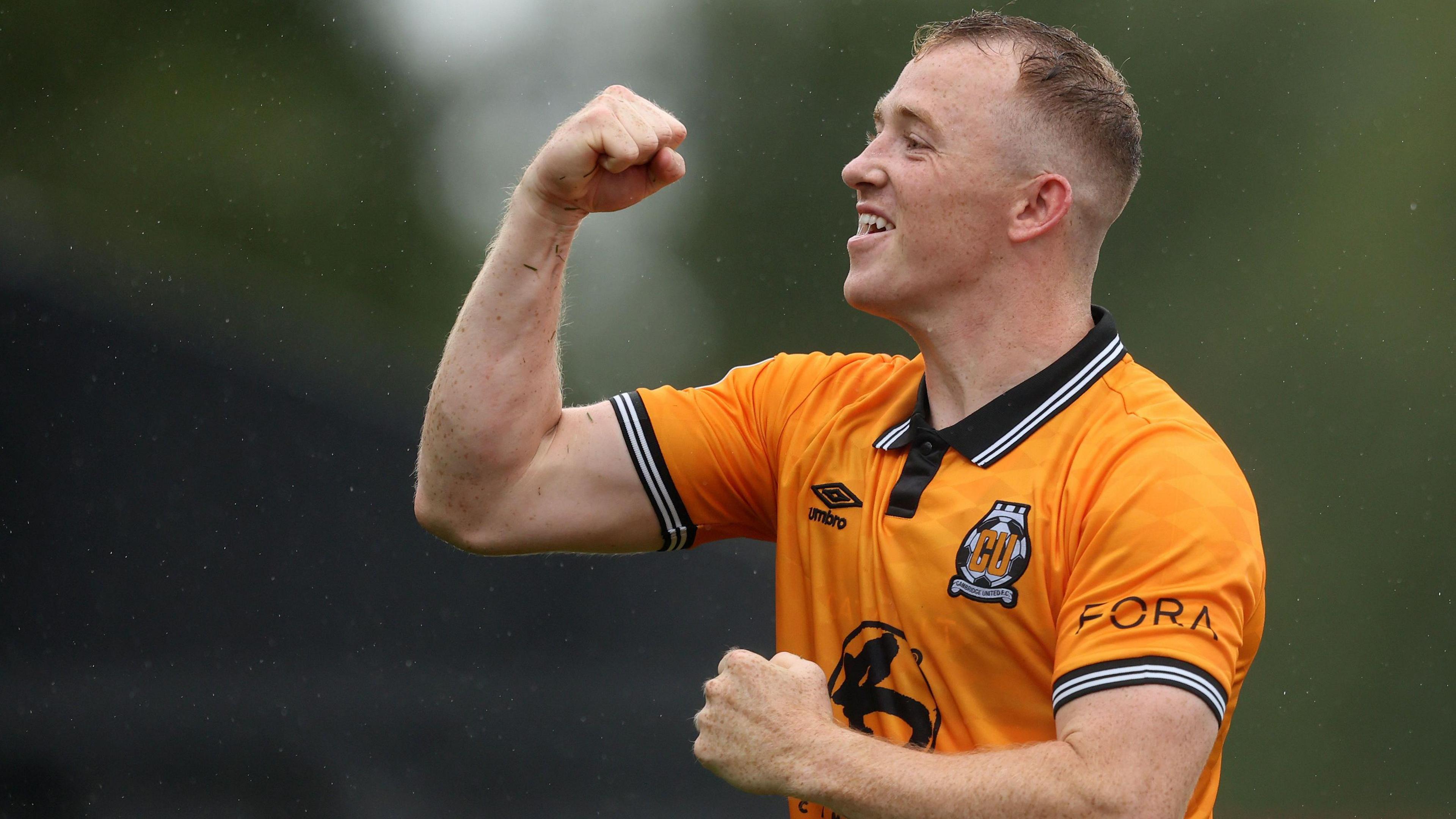 Shayne Lavery celebrating scoring a goal for Cambridge United