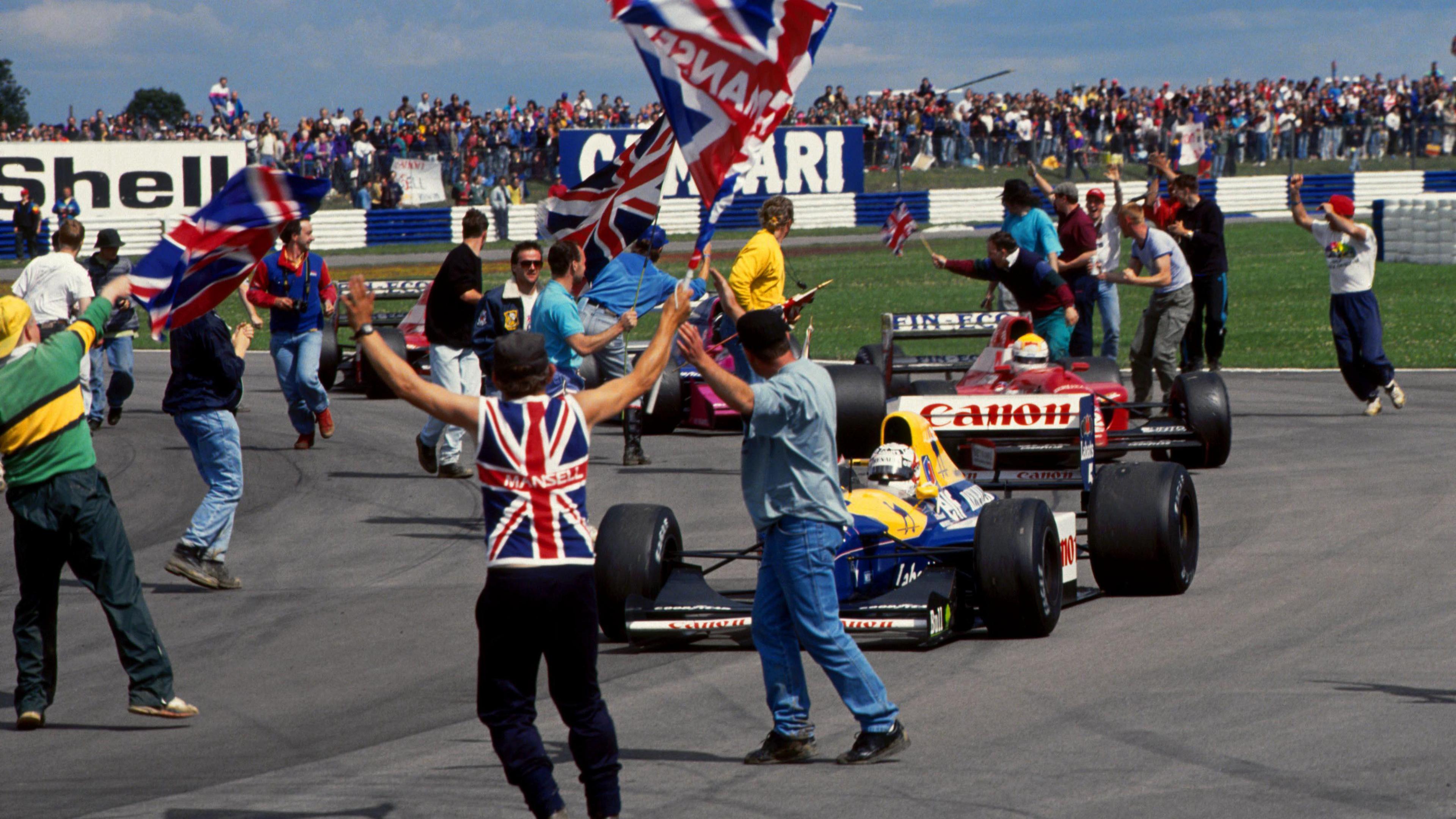 Members of the crowd invade the track to acclaim Mansell's dominant 1992 victory