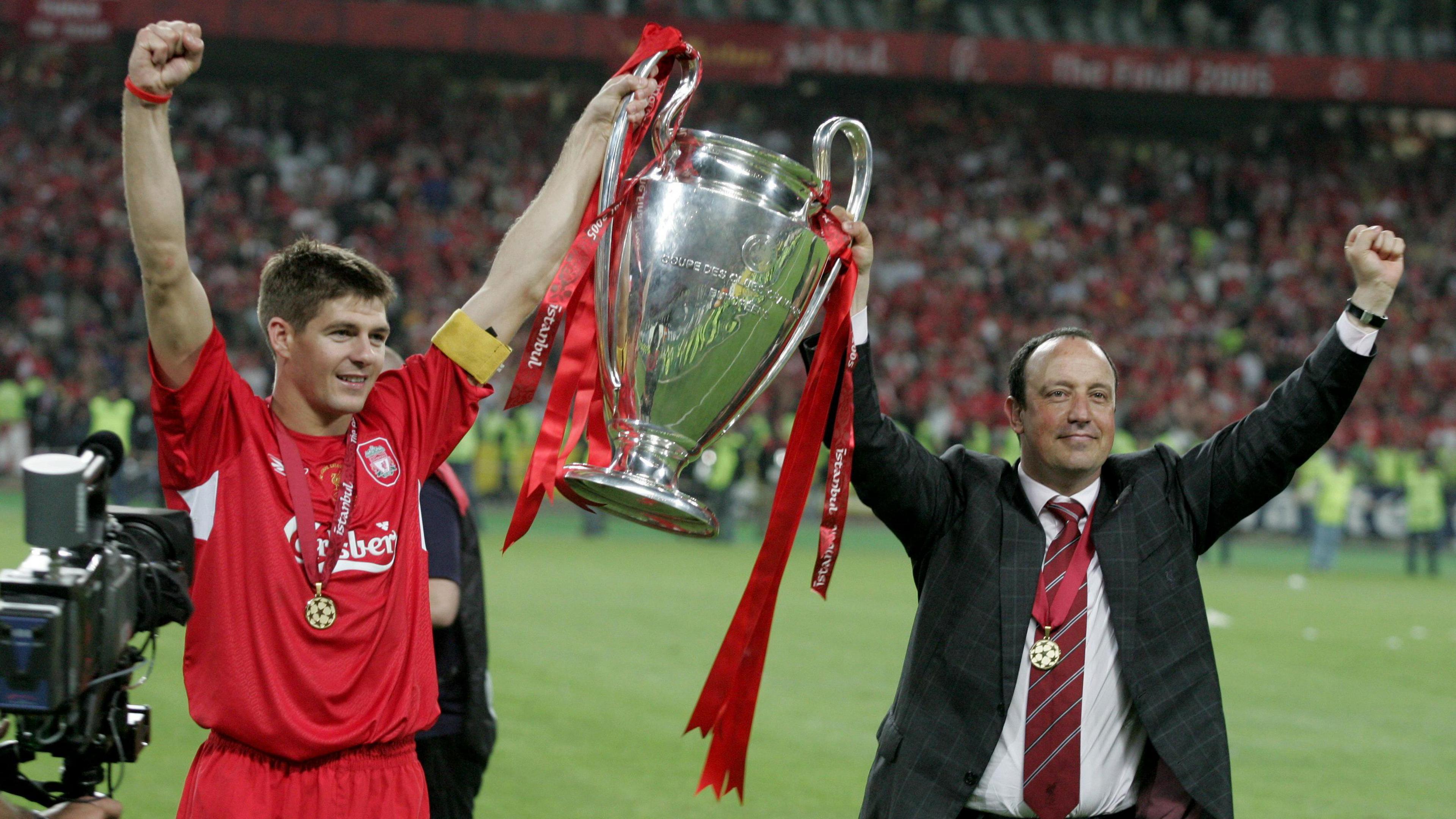 Steven Gerrard and Rafael Benitez hold Champions League trophy