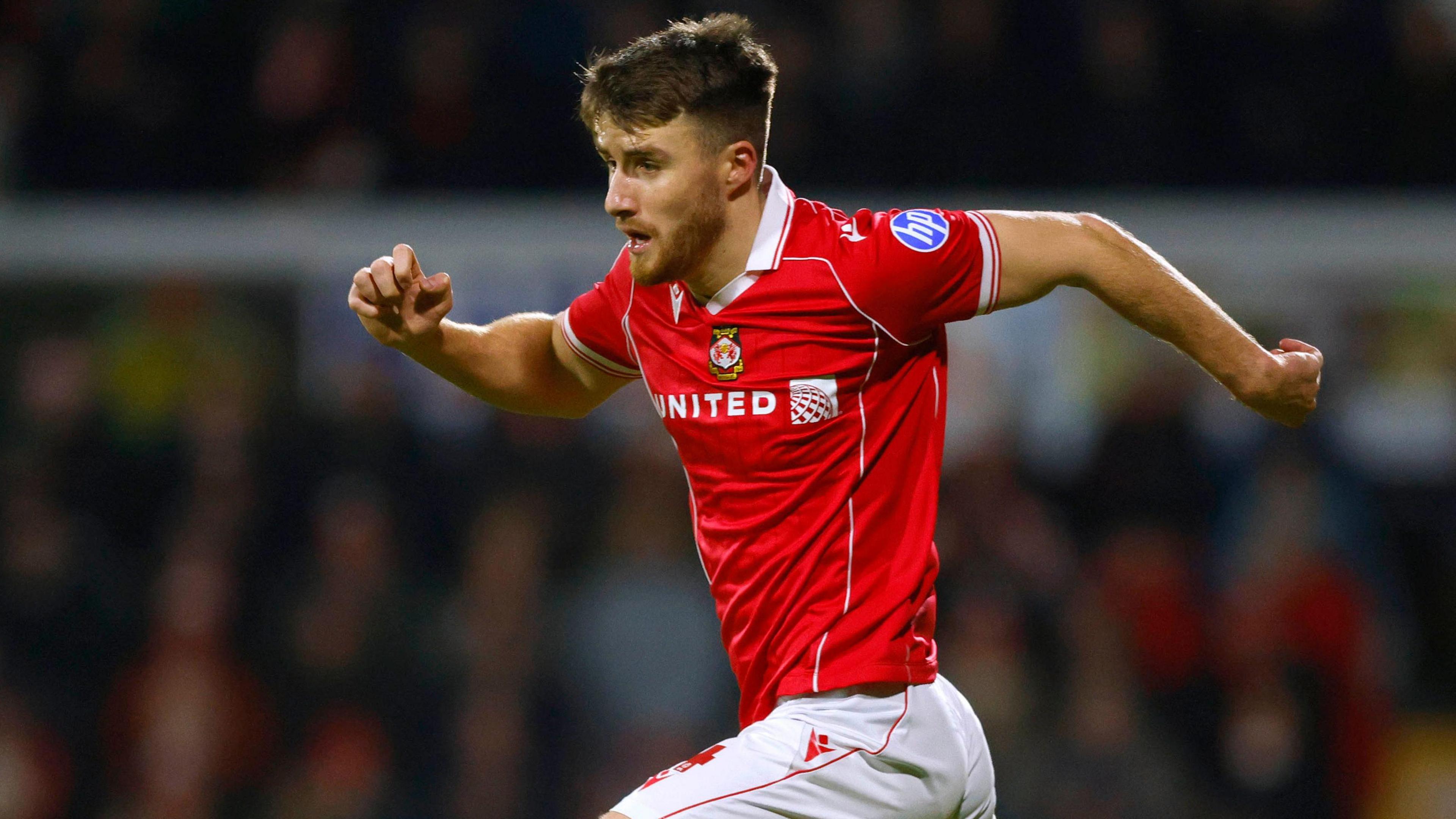 George Thomason in action for Wrexham