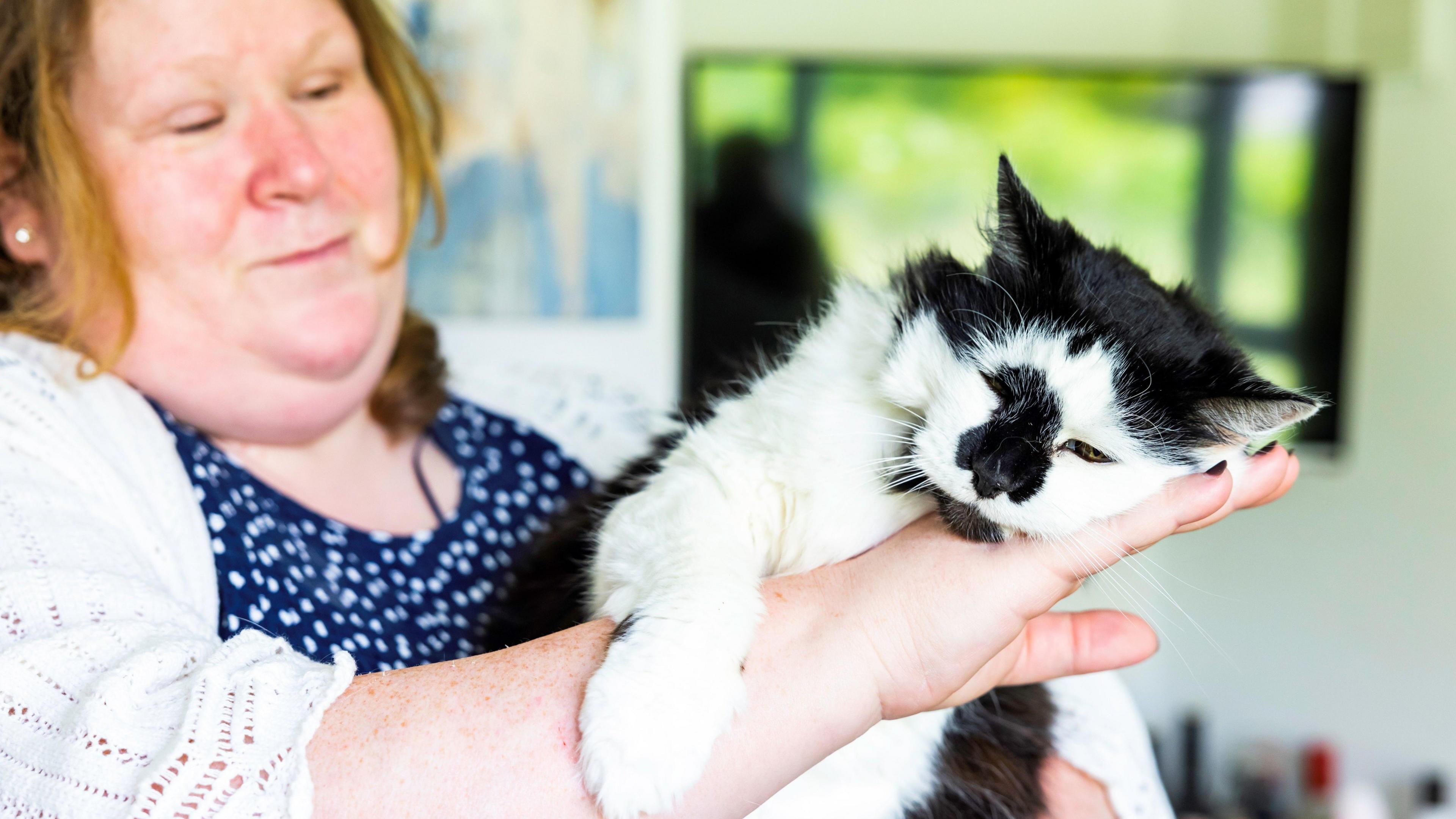 Alyson Laing with Katie the cat