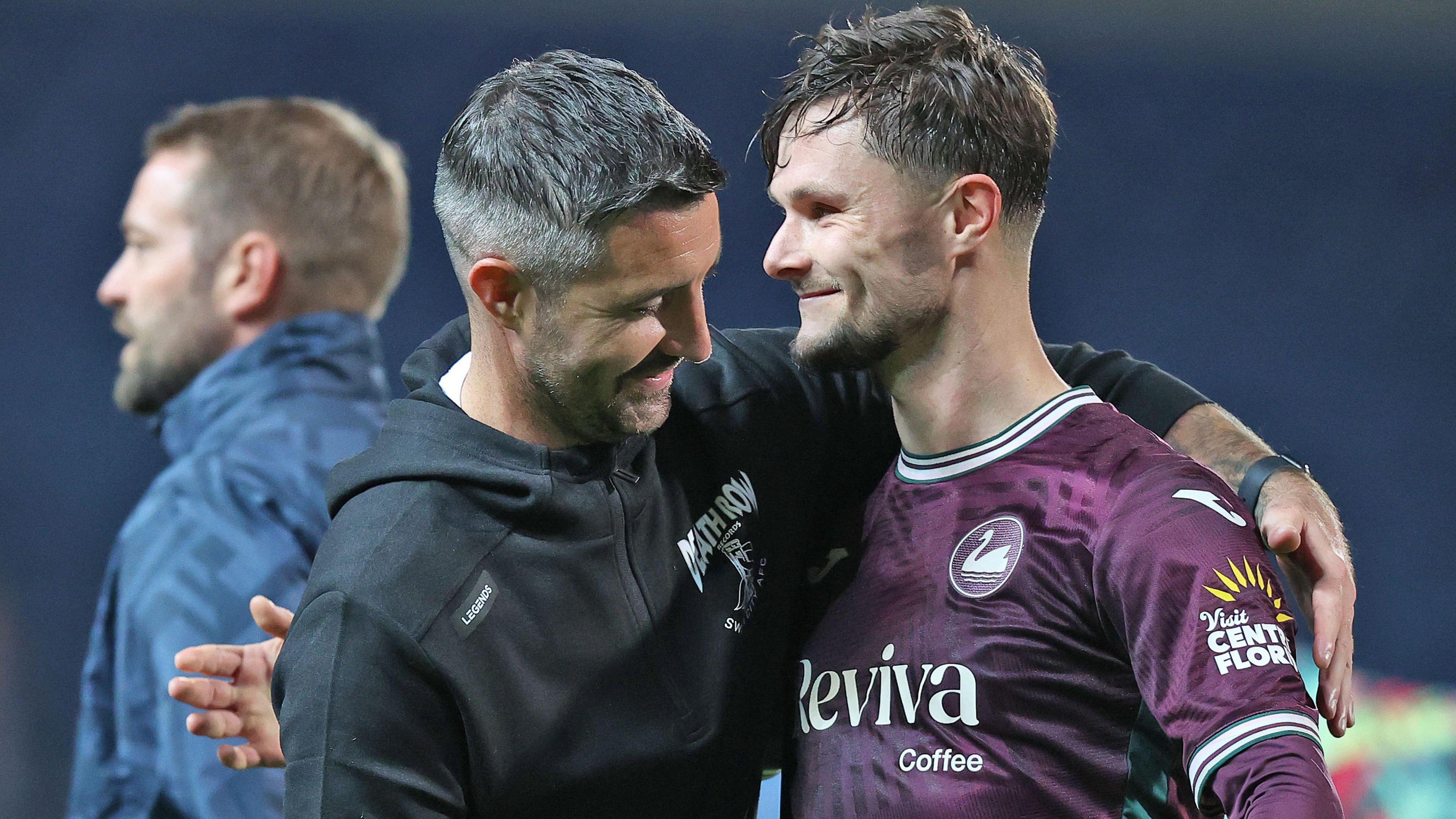 Alan Sheehan congratulates Liam Cullen after Swansea's win at Blackburn 