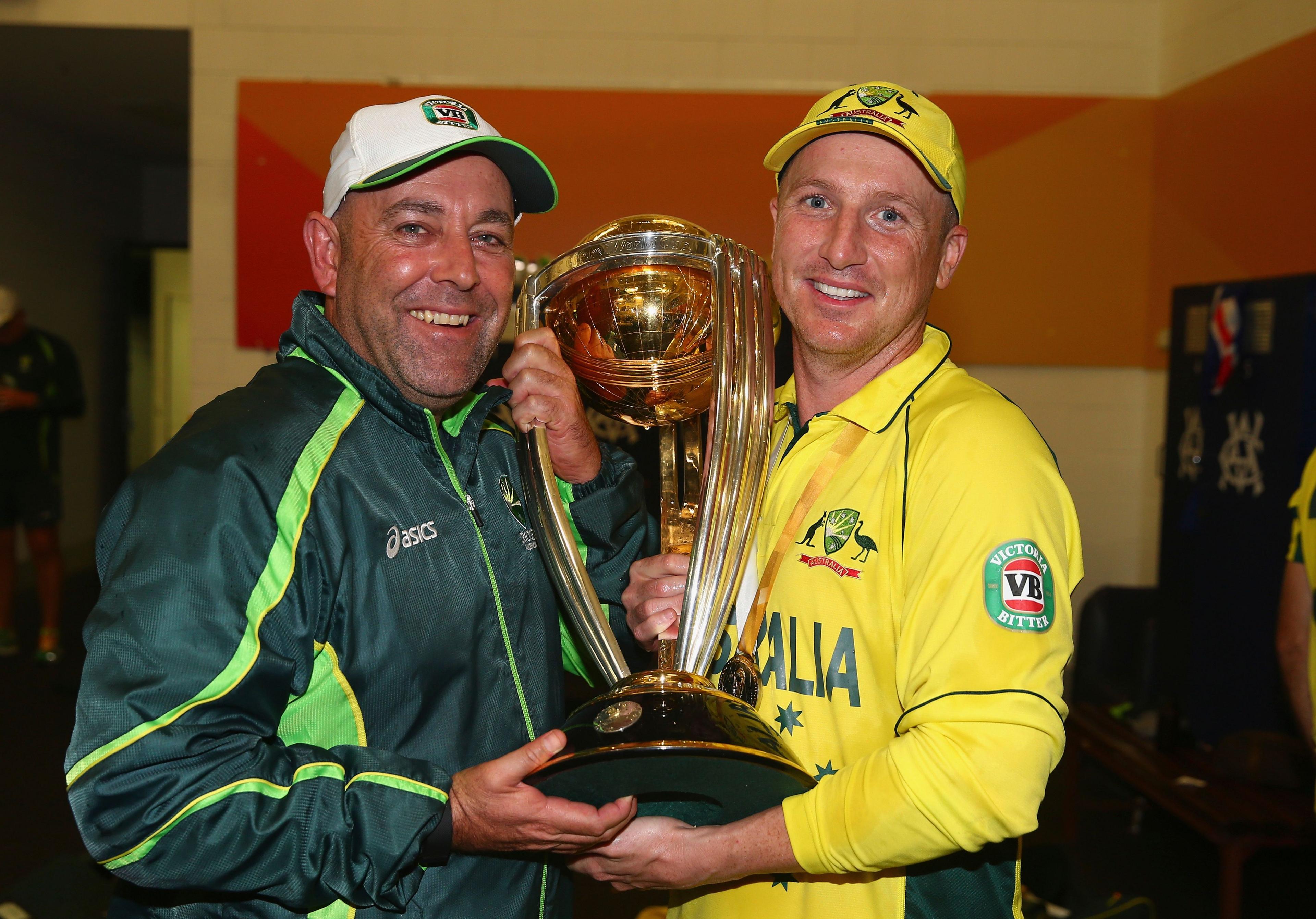 Darren Lehmann holds the World Cup with Brad Haddin in 2015