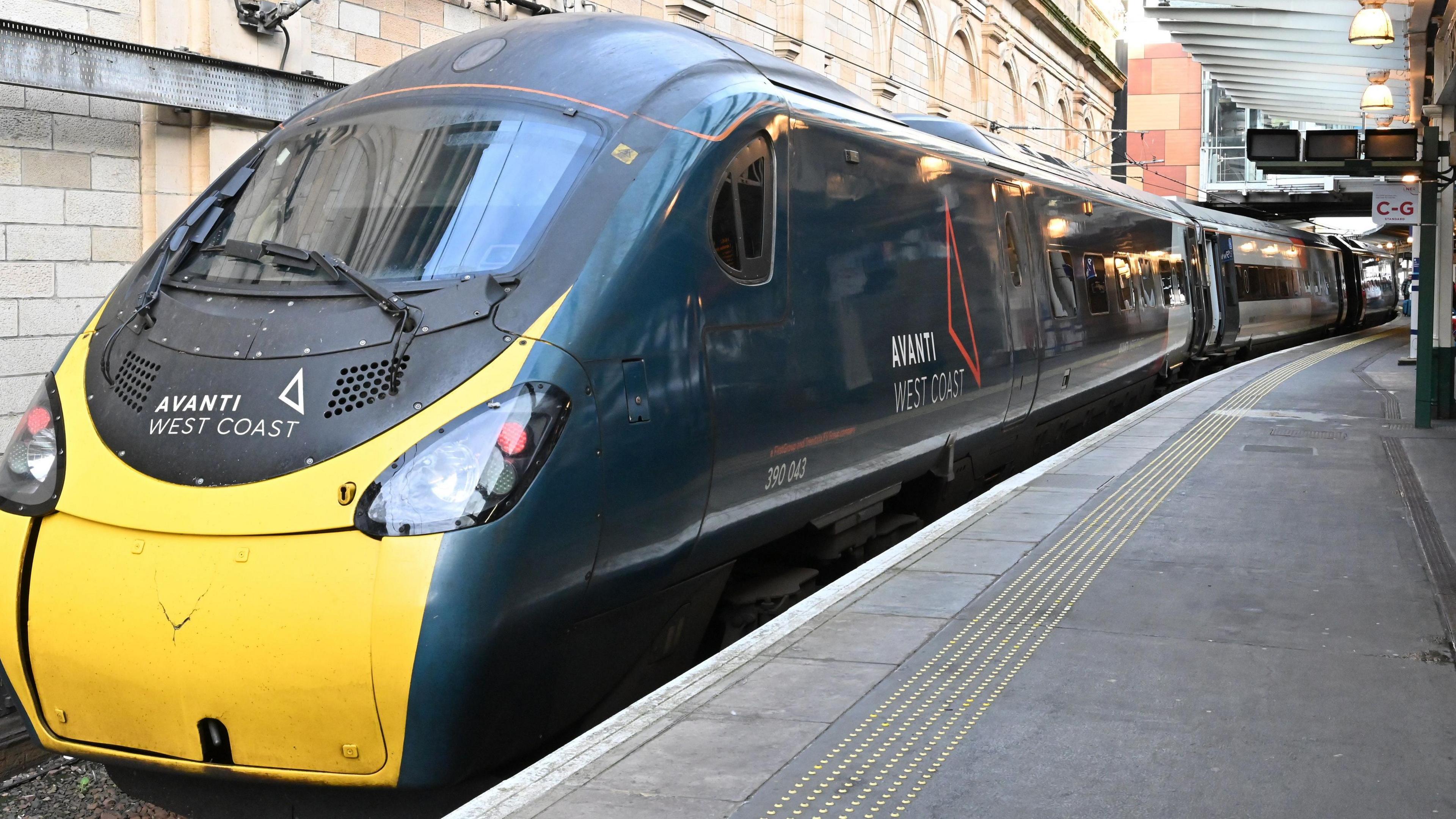 An Avanti West Coast train pulling in to Edinburgh Waverley train station.