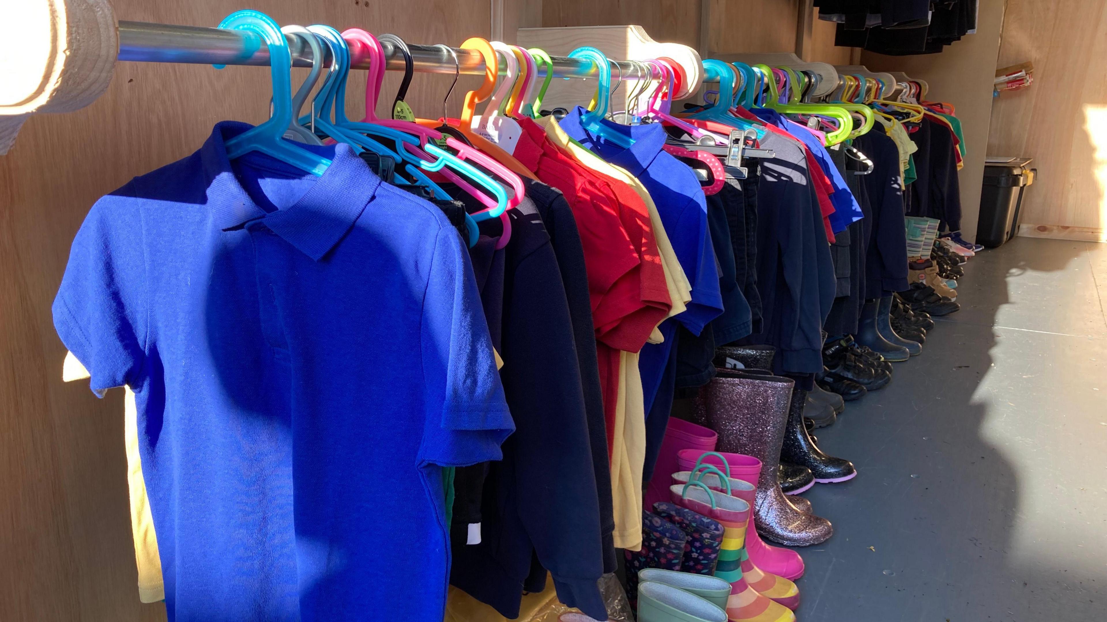 childrens clothes on a rail