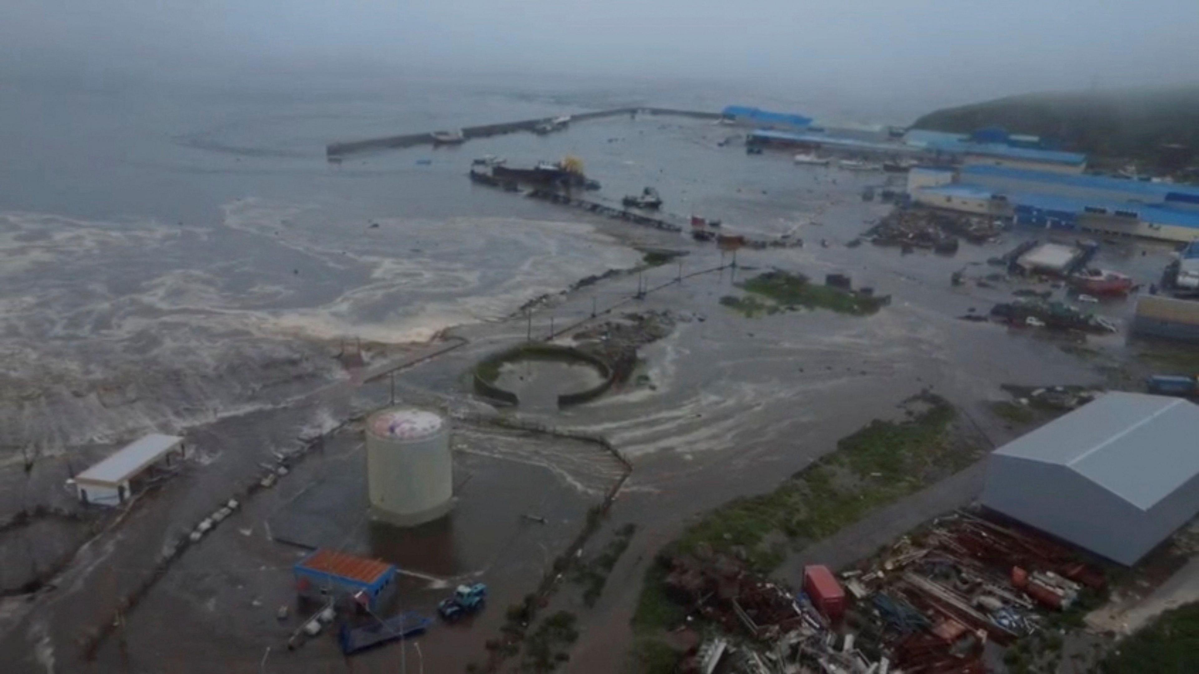 Tsunami waves flood an area after a powerful magnitude 8.8 earthquake struck off Russia's far eastern Kamchatka Peninsula, in Severo-Kurilsk, Sakhalin Region, Russia, July 30, 2025.