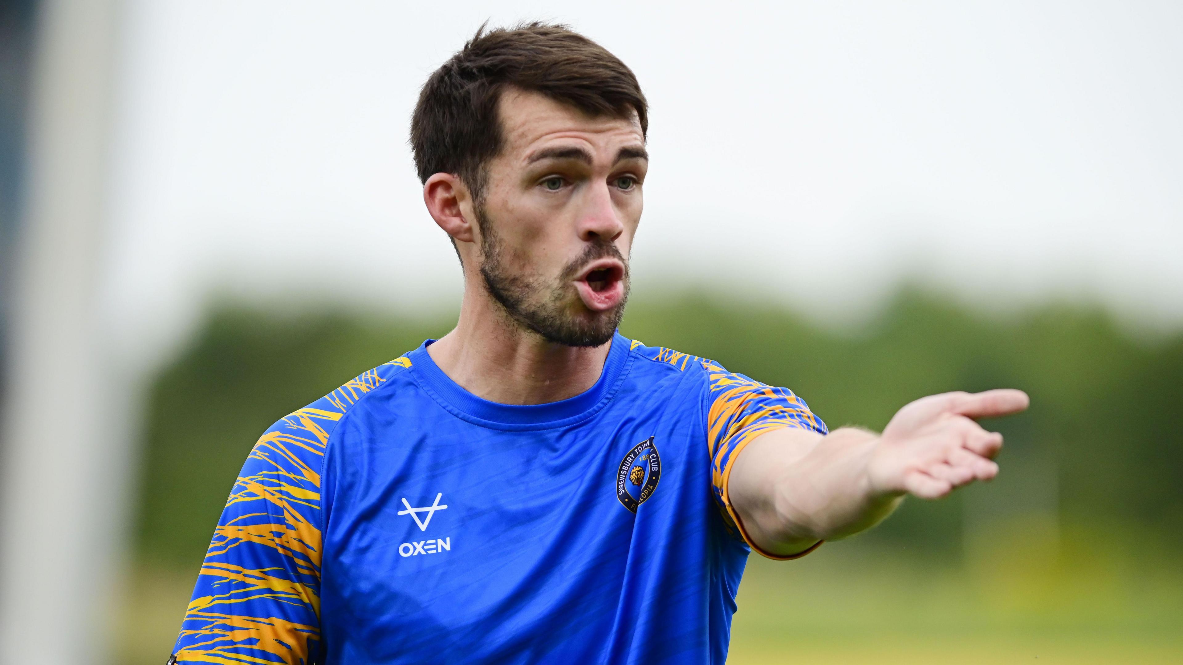 Shrewsbury Town striker John Marquis shouts during pre-season training