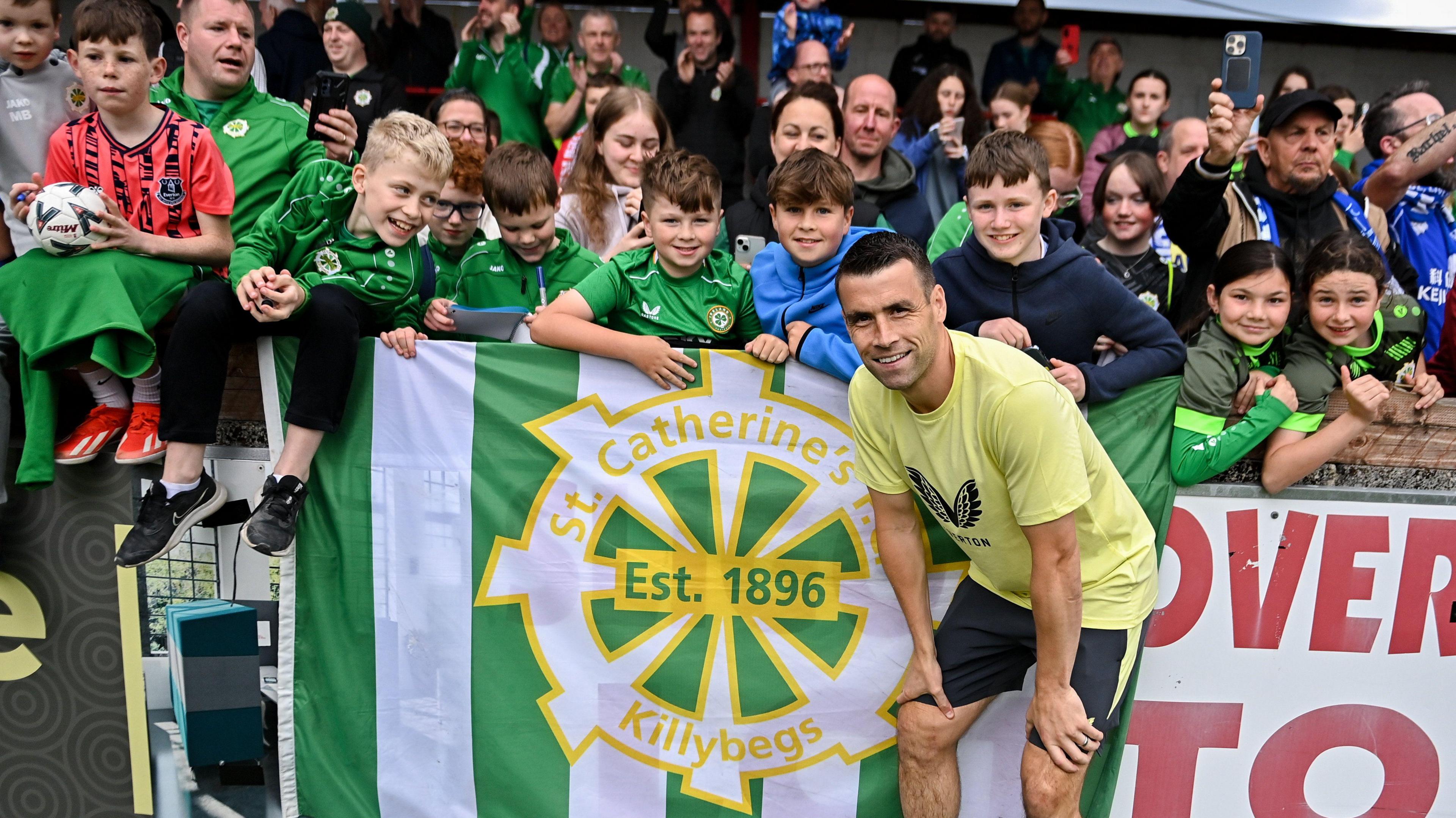 Seamus Coleman poses with fans