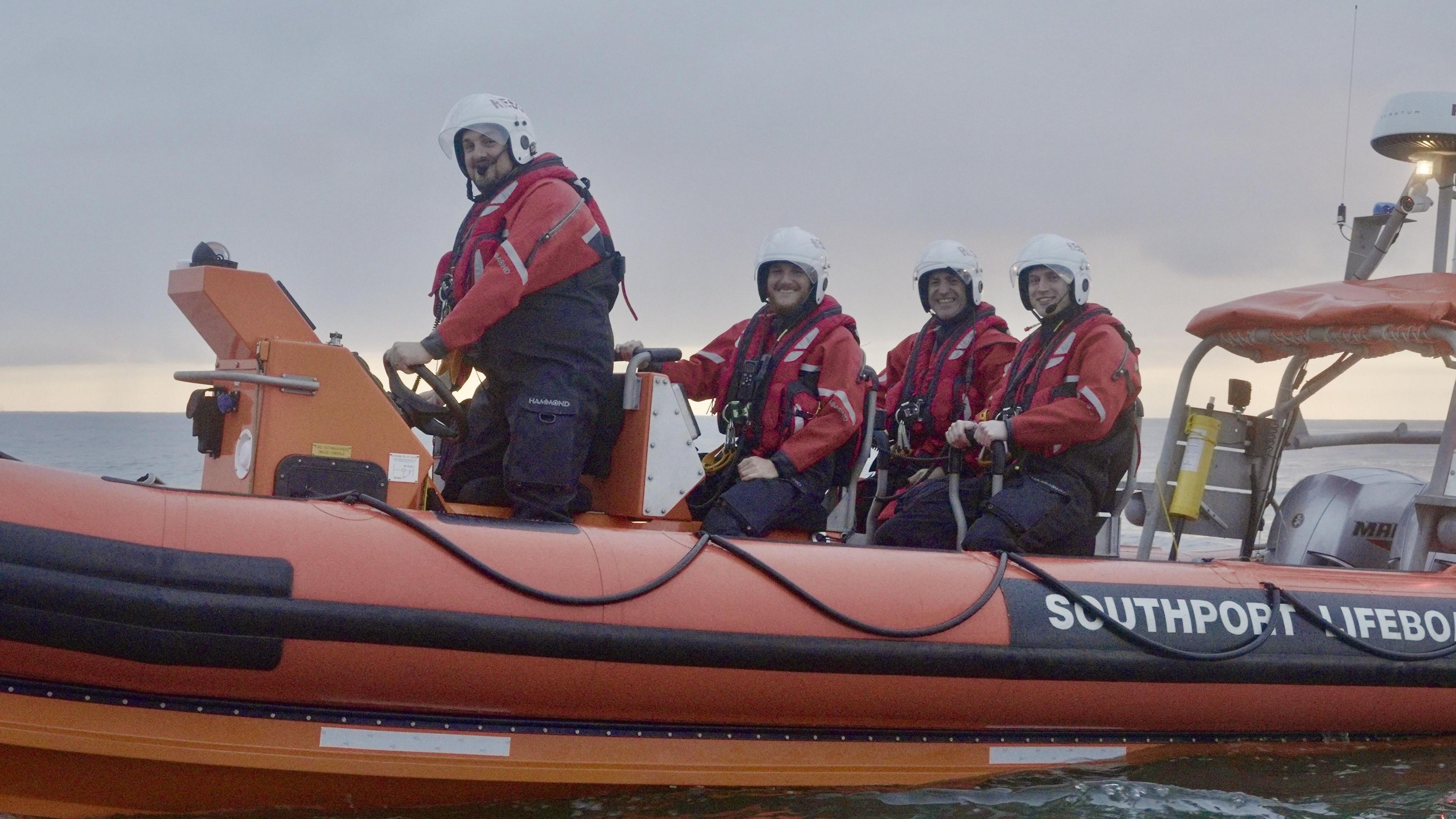 One of the Southport lifeboat's boats with four crew members on board 