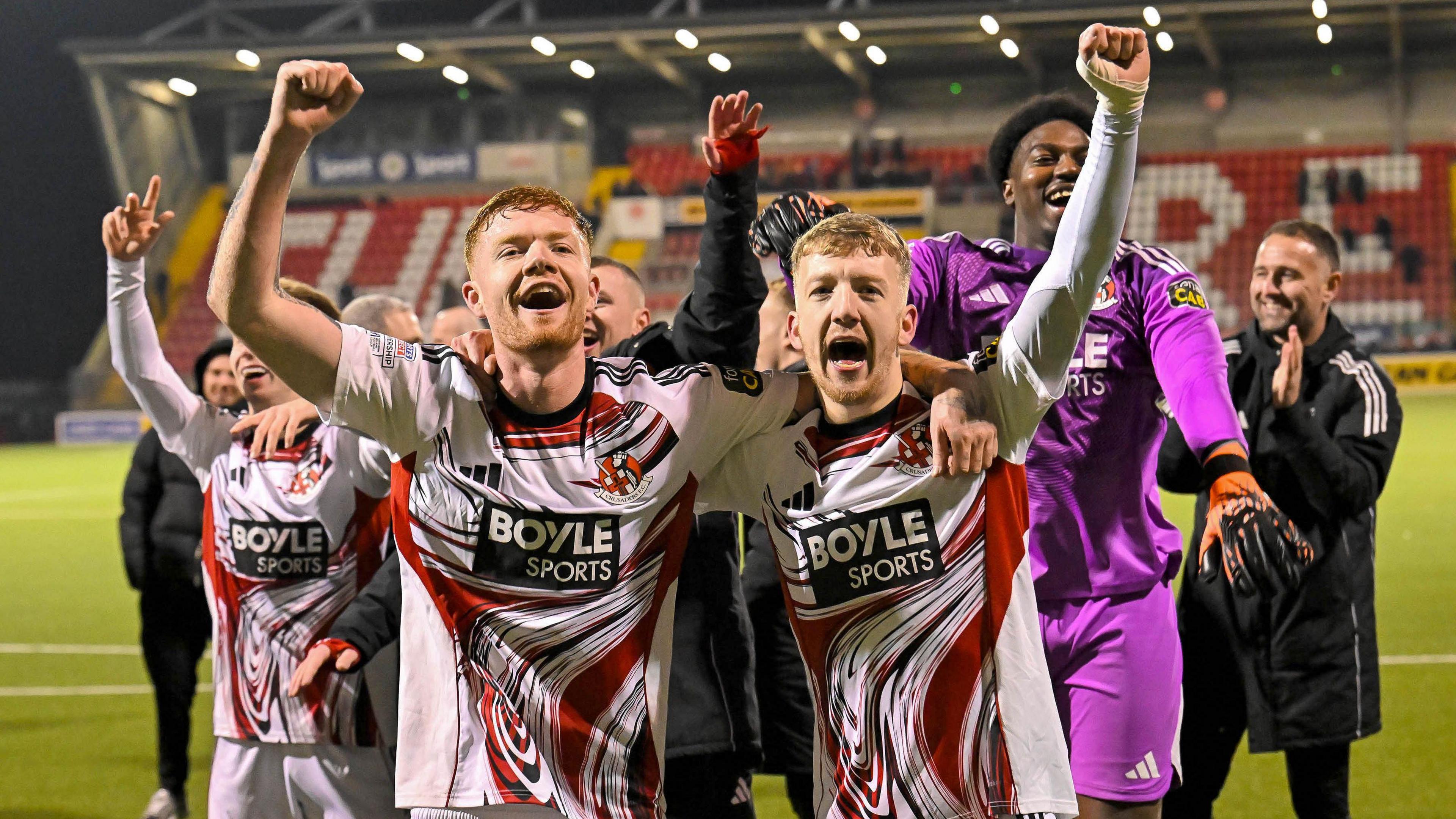 Fraser Bryden and Kurtis Forsythe celebrate Crusaders' victory