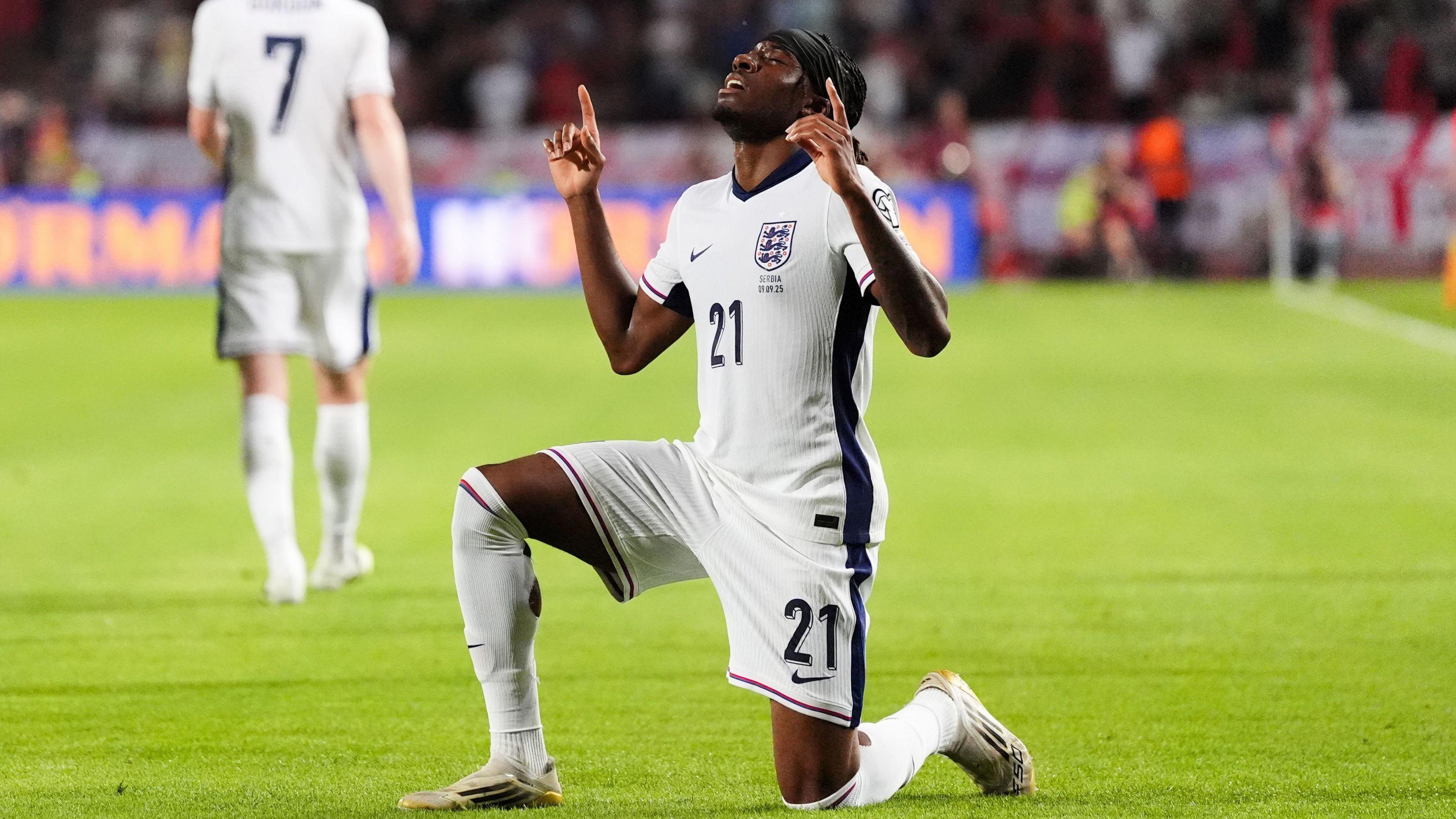 Noni Madueke celebrates after scoring his first international goal in England's World Cup qualifier in Serbia