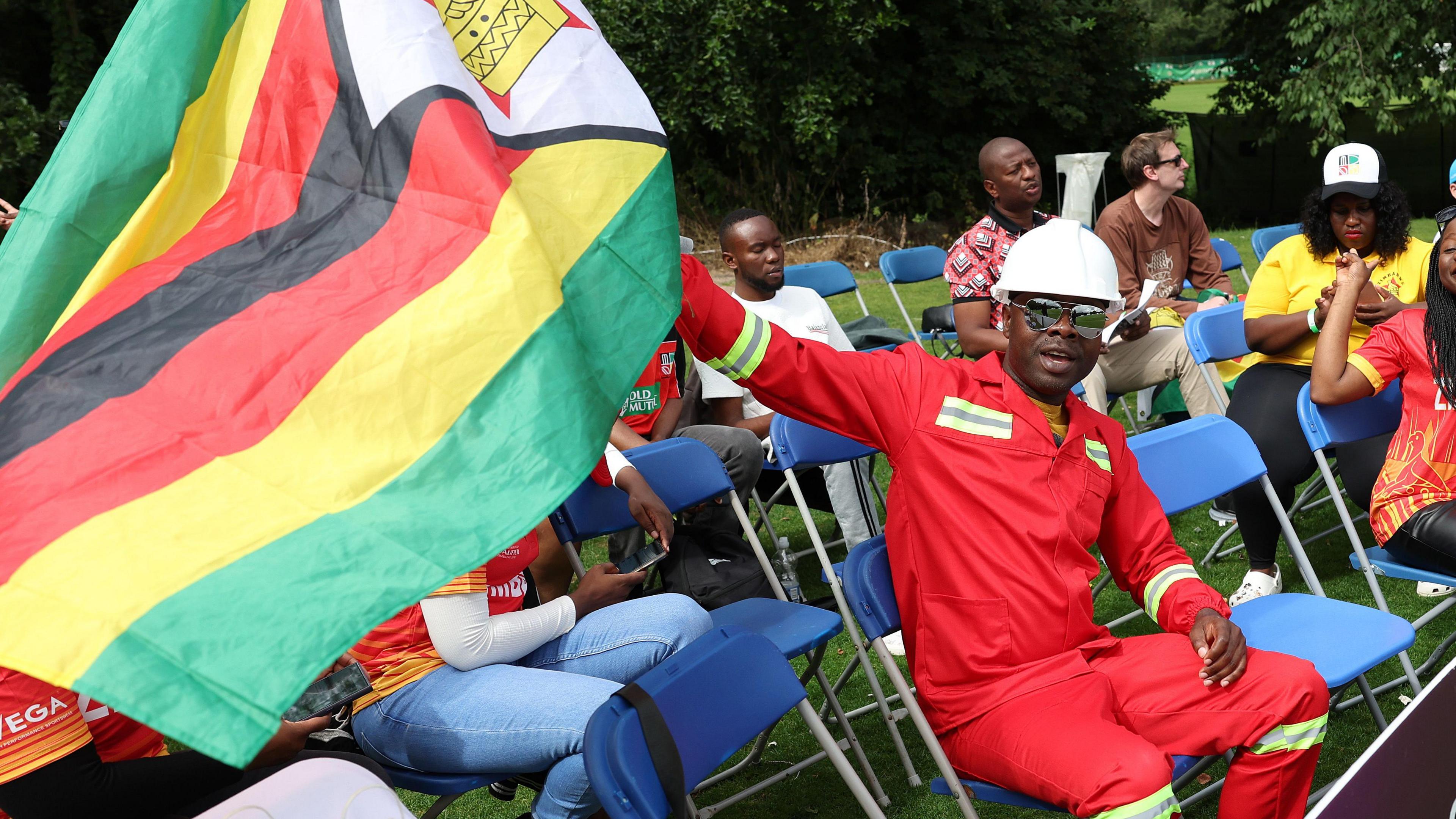 A Zimbabwe fan enjoys the Test match in Belfast