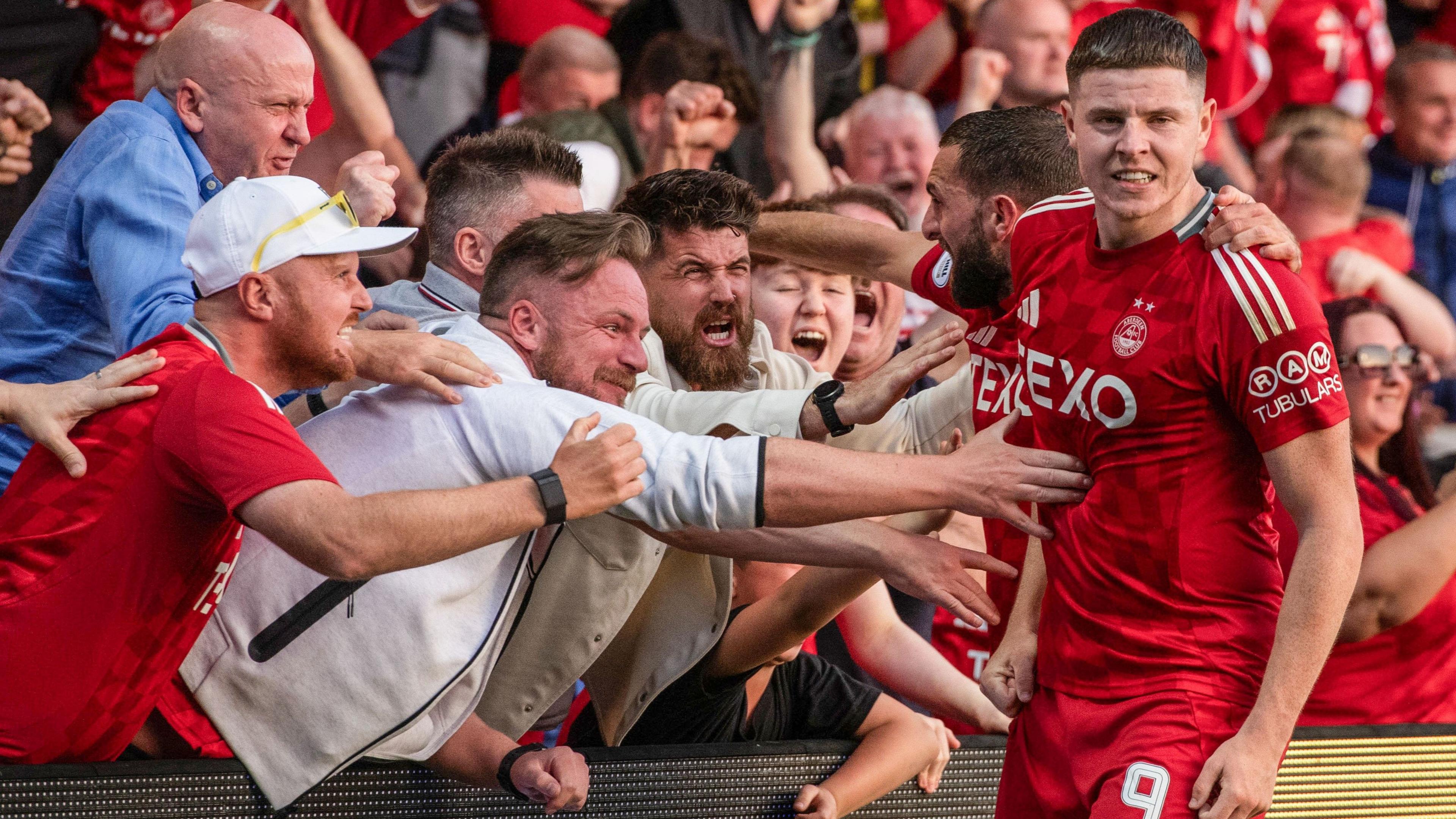 Kevin Nisbet celebrates scoring for Aberdeen