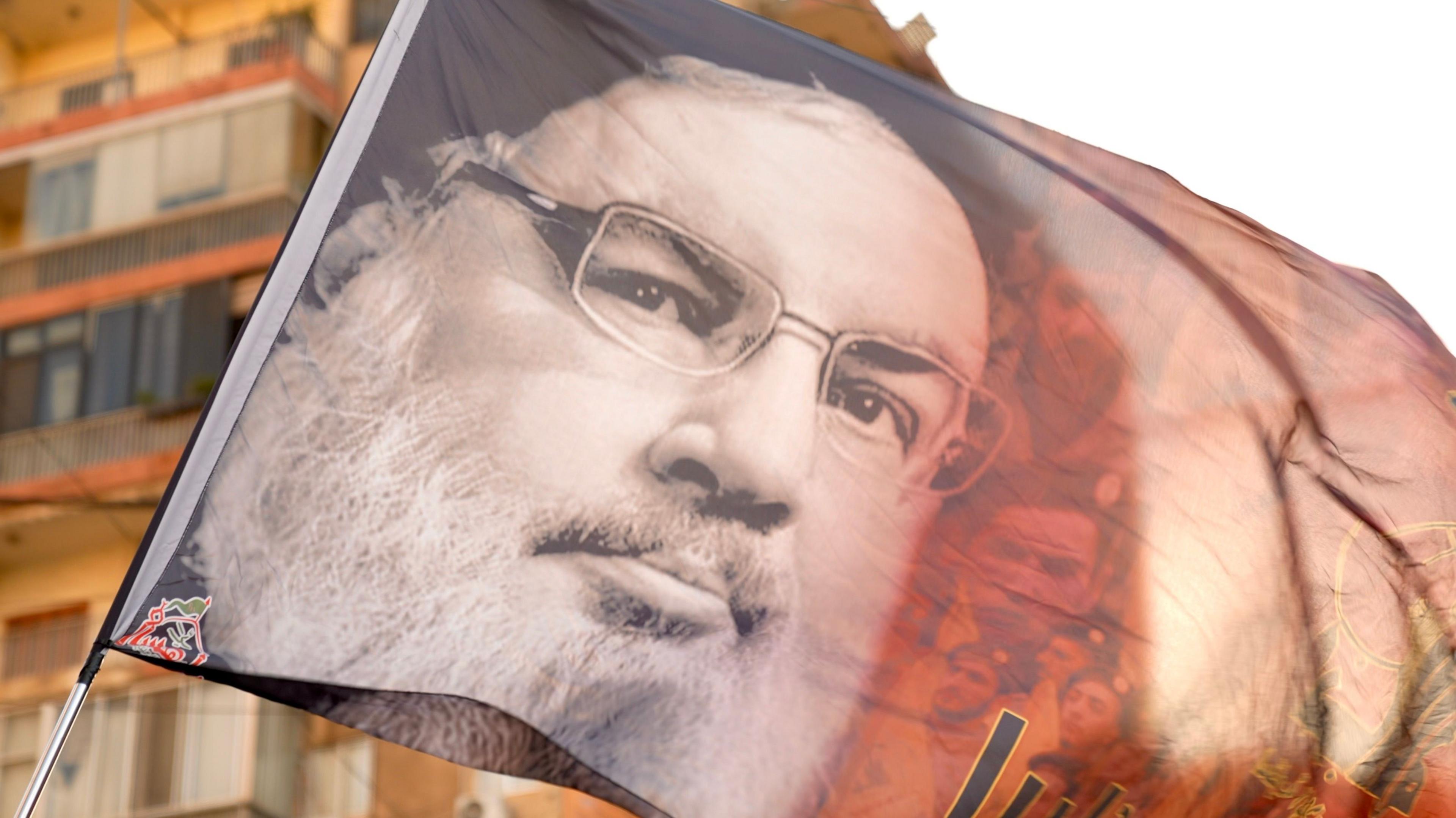 A flag with a photo late Hezbollah leader Hassan Nasrallah in Beirut