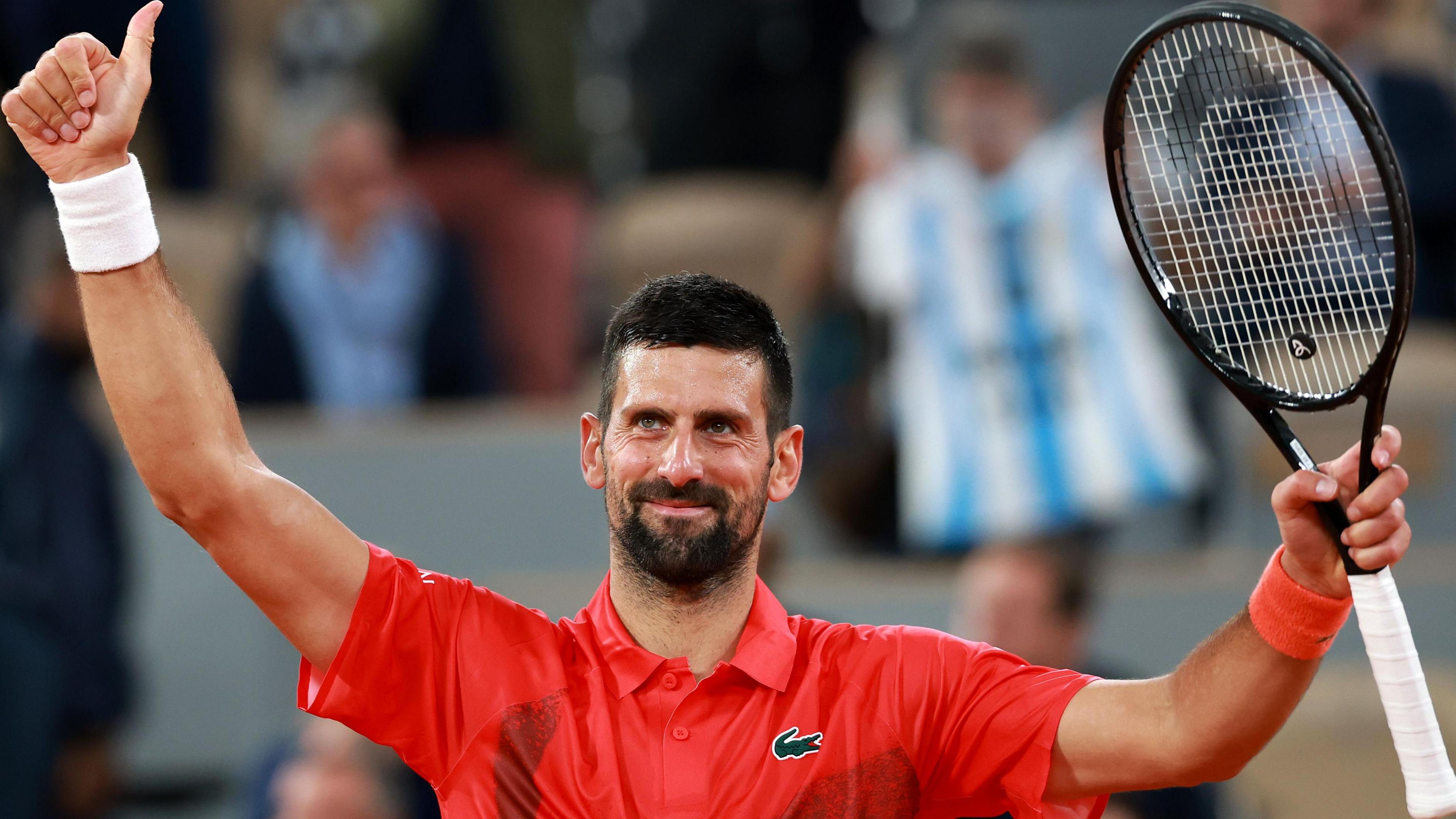 Novak Djokovic celebrates his victory at the French Open