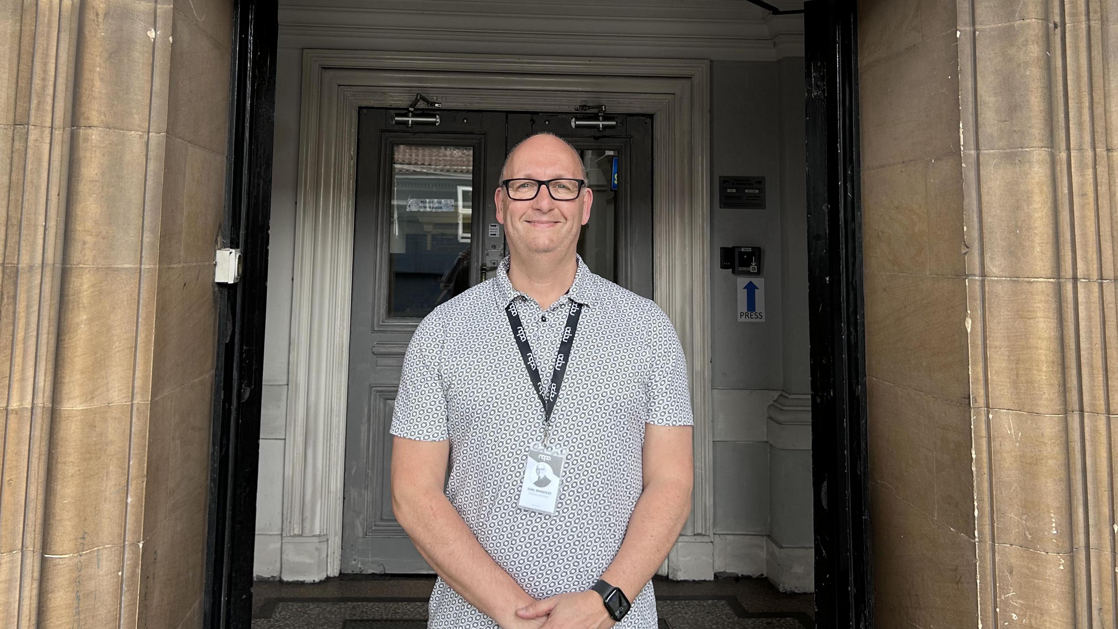 Carl Wheatley outside the building