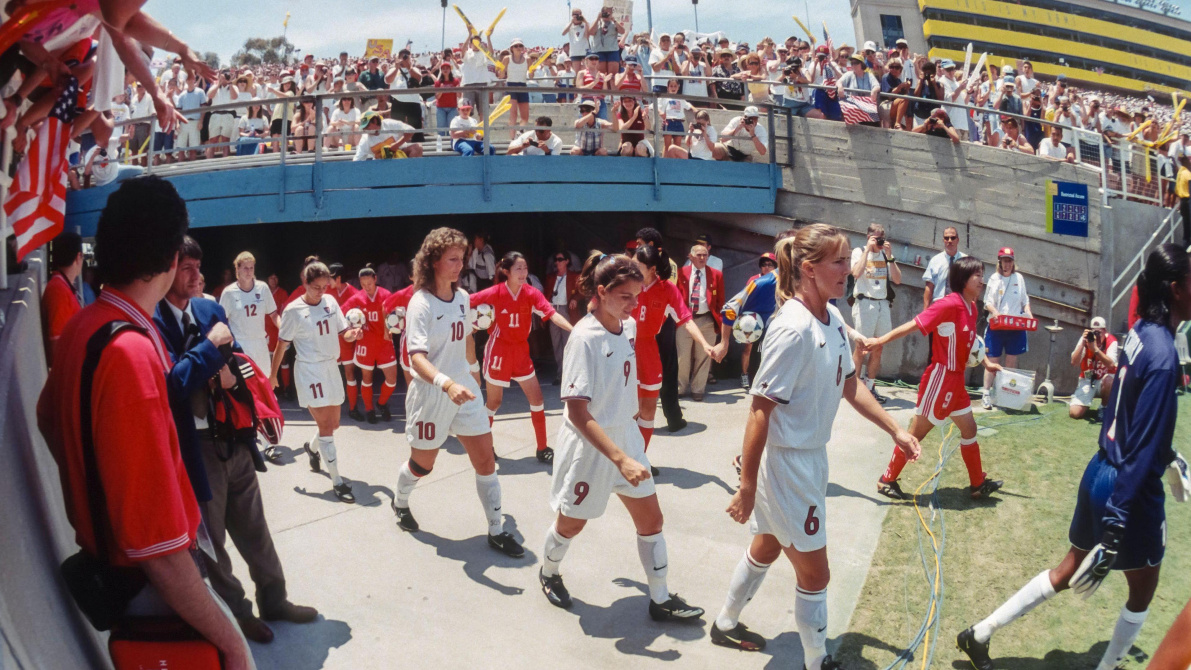  The USA and China national teams enter the field prior to the final game at the Rose Bowl in California