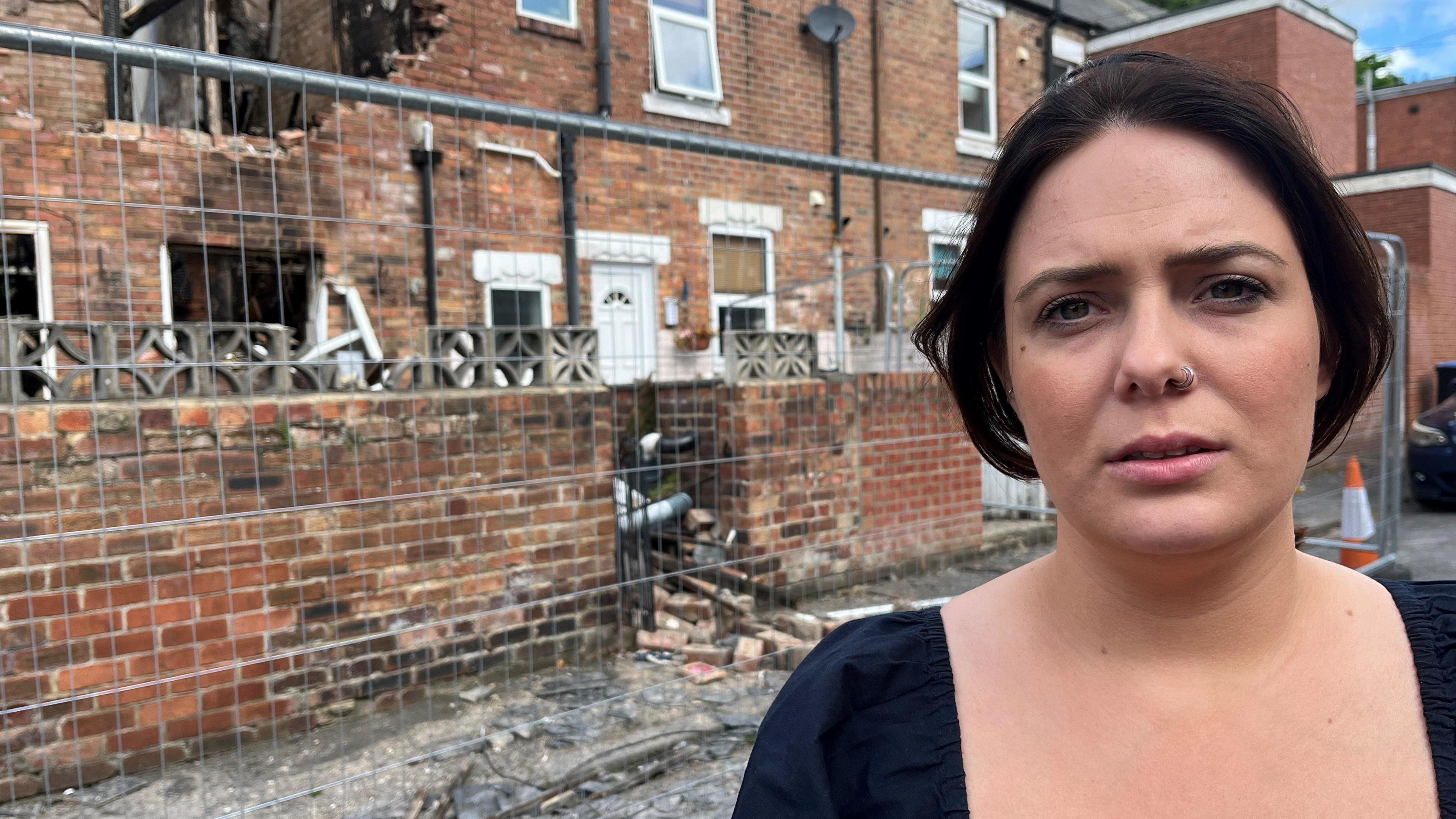 Grace outside her neighbour's house on Coronation Terrace in Willington