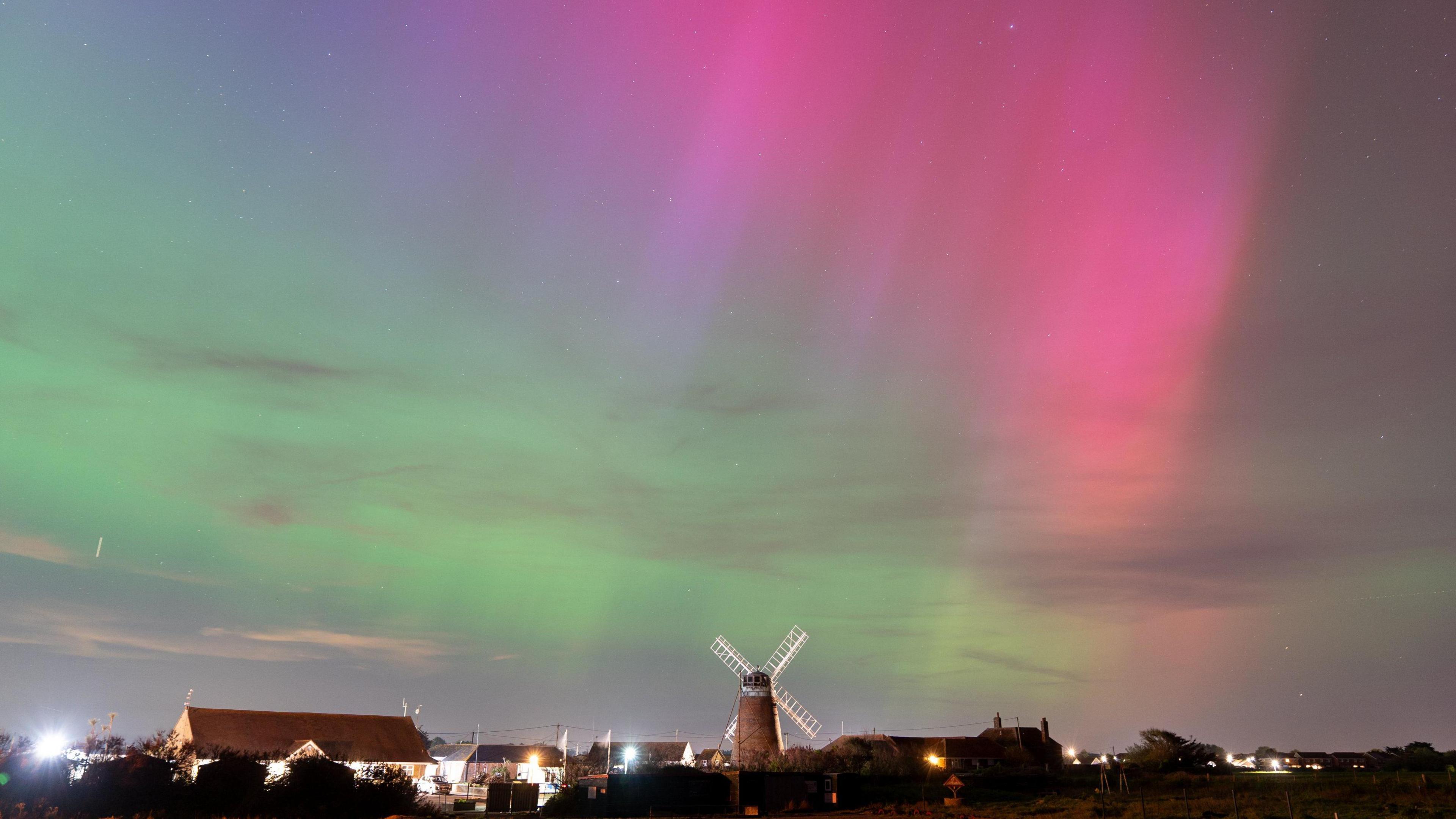 Aurora borealis over a windmill in Selsey