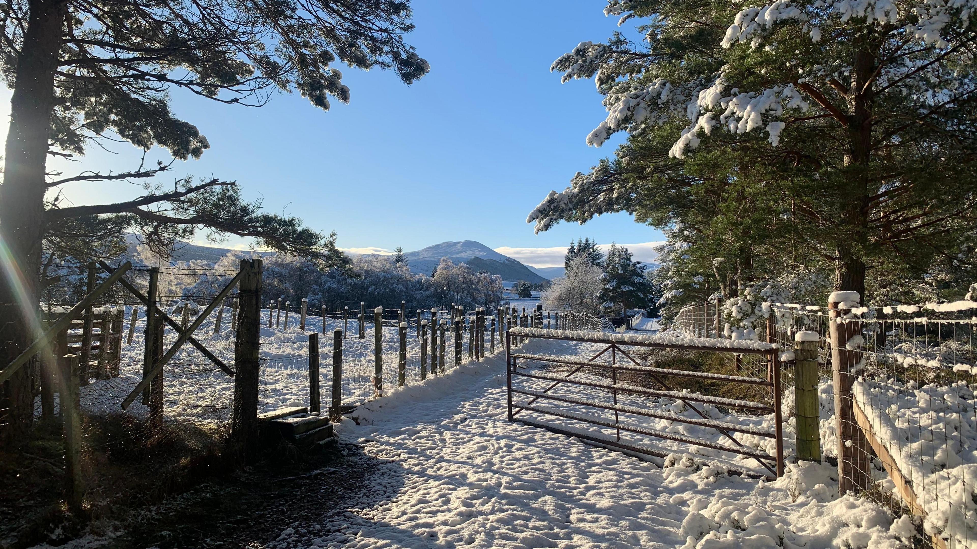 A photo of a snow covered landscape in Scotland