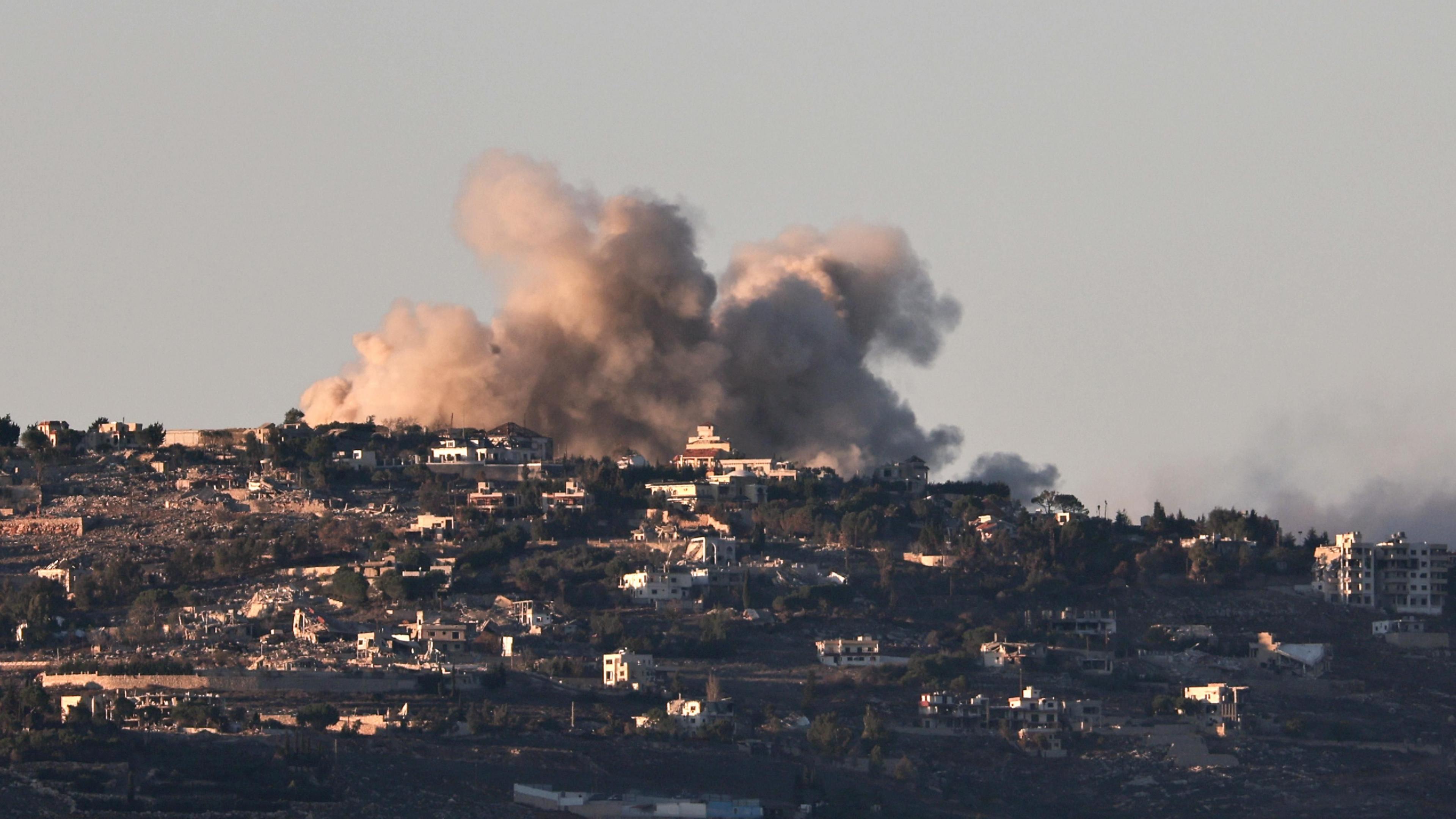 Israeli air strike on southern Lebanese town of Al Khiam - billowing smoke over built-up area