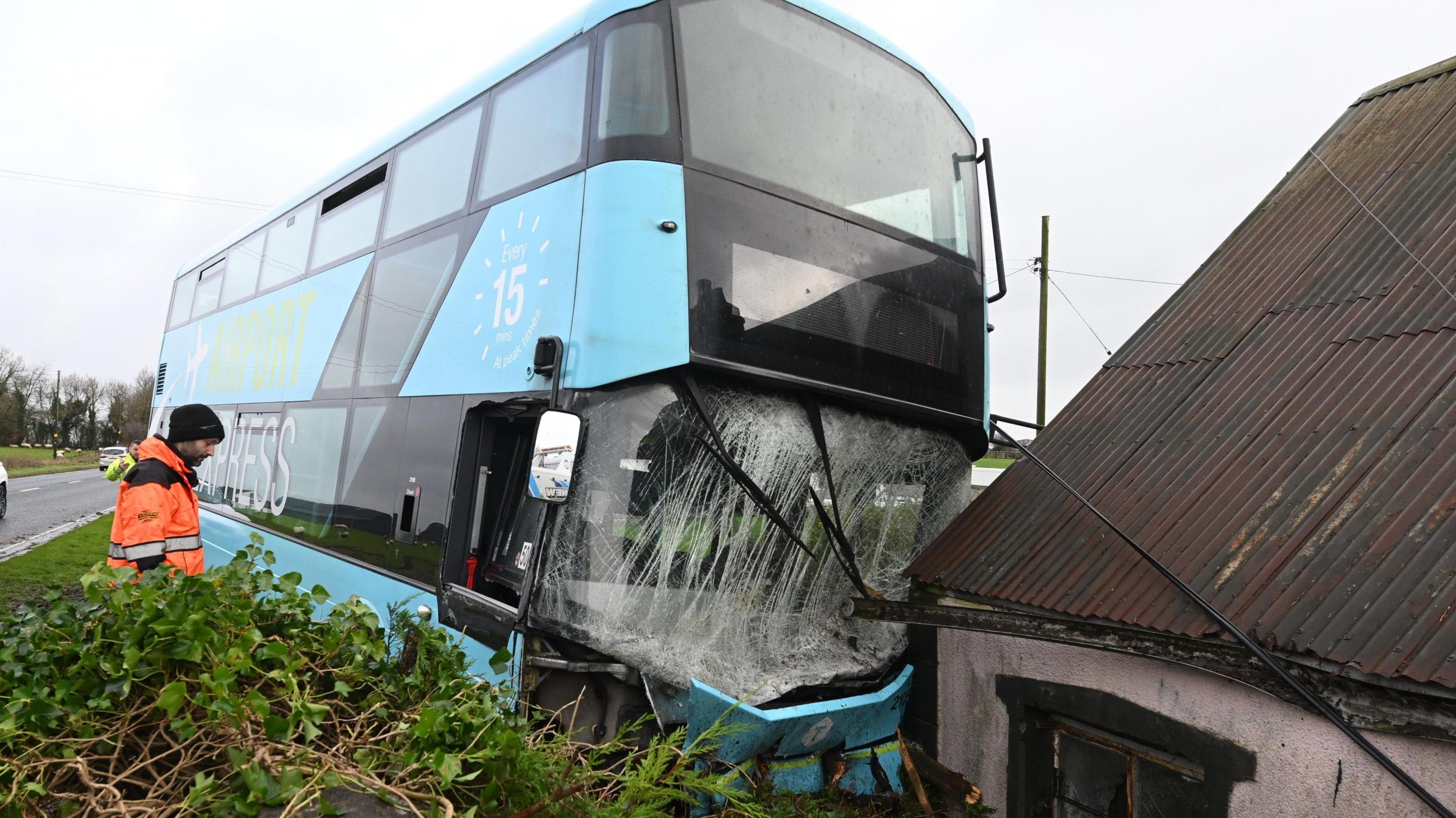 Double decker bus crashed into a house