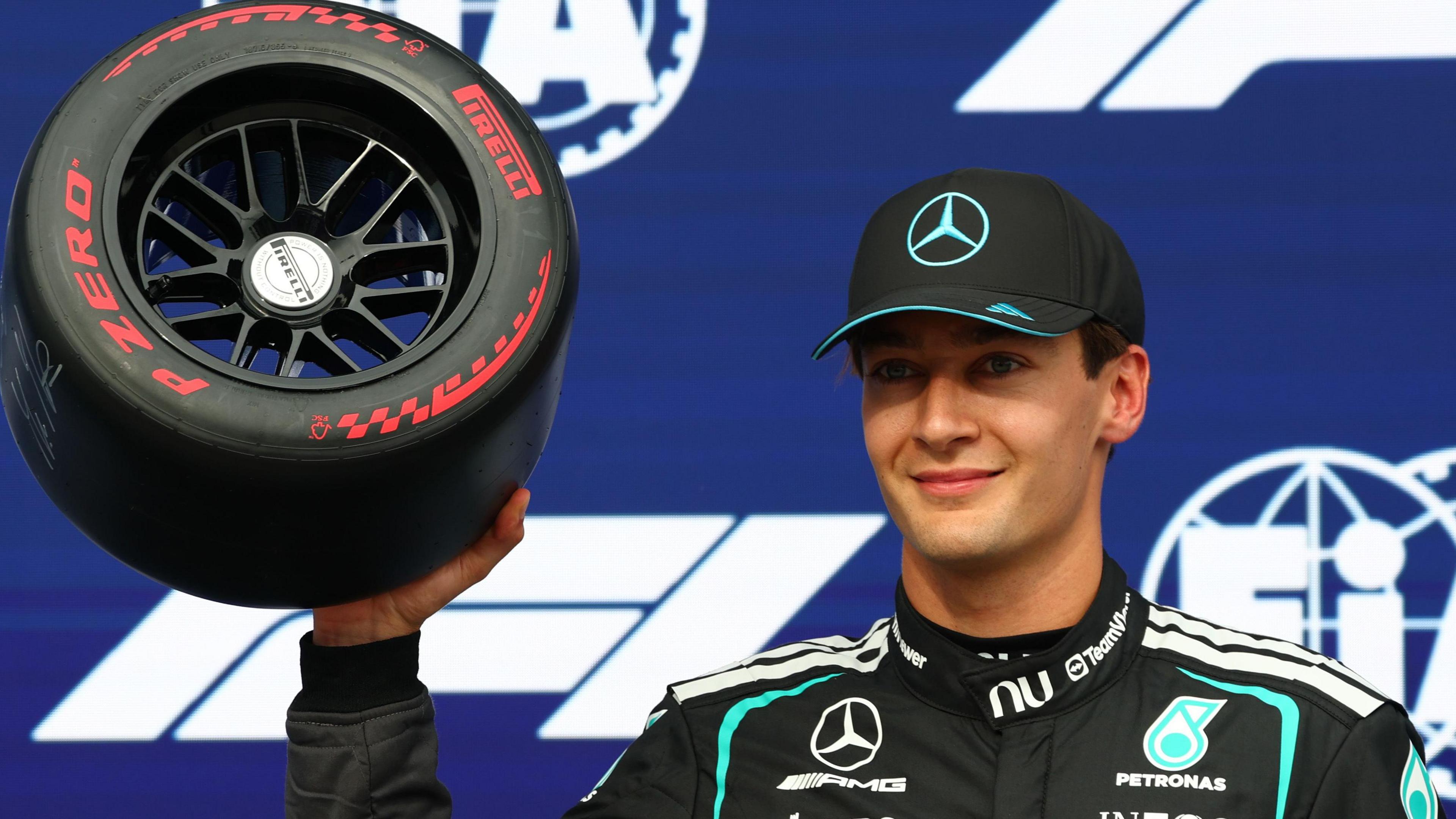 Mercedes driver George Russell holds aloft the Pirelli pole position at the 2026 Canadian Grand Prix