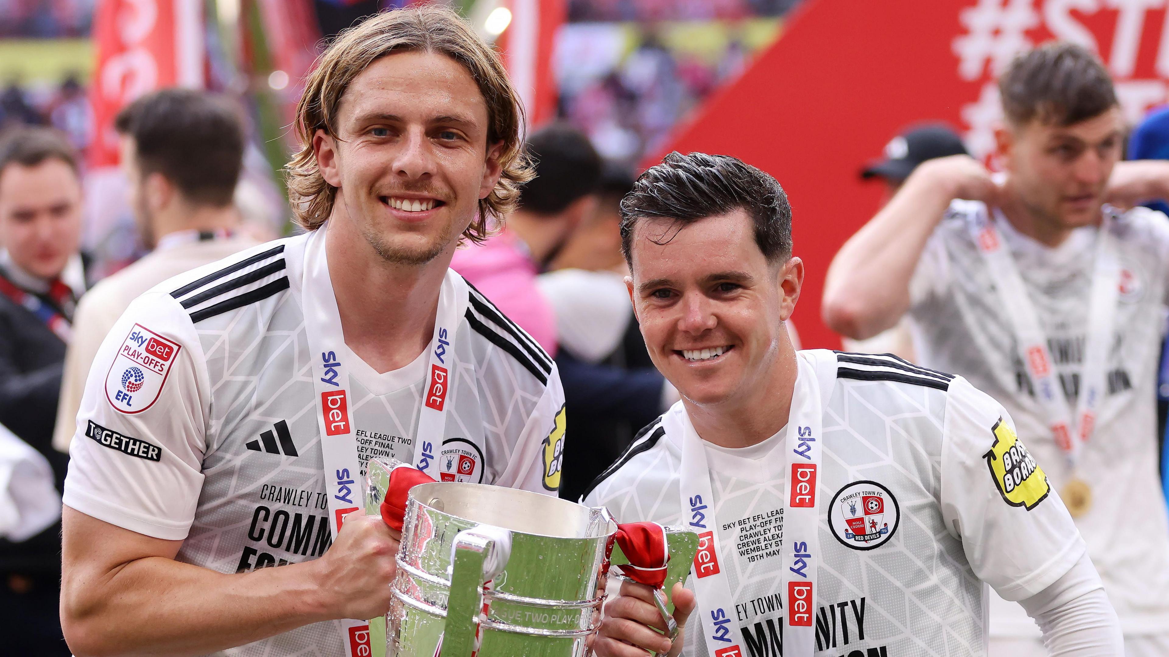 Danilo Orsi with the league two play off final trophy at Wembley. 