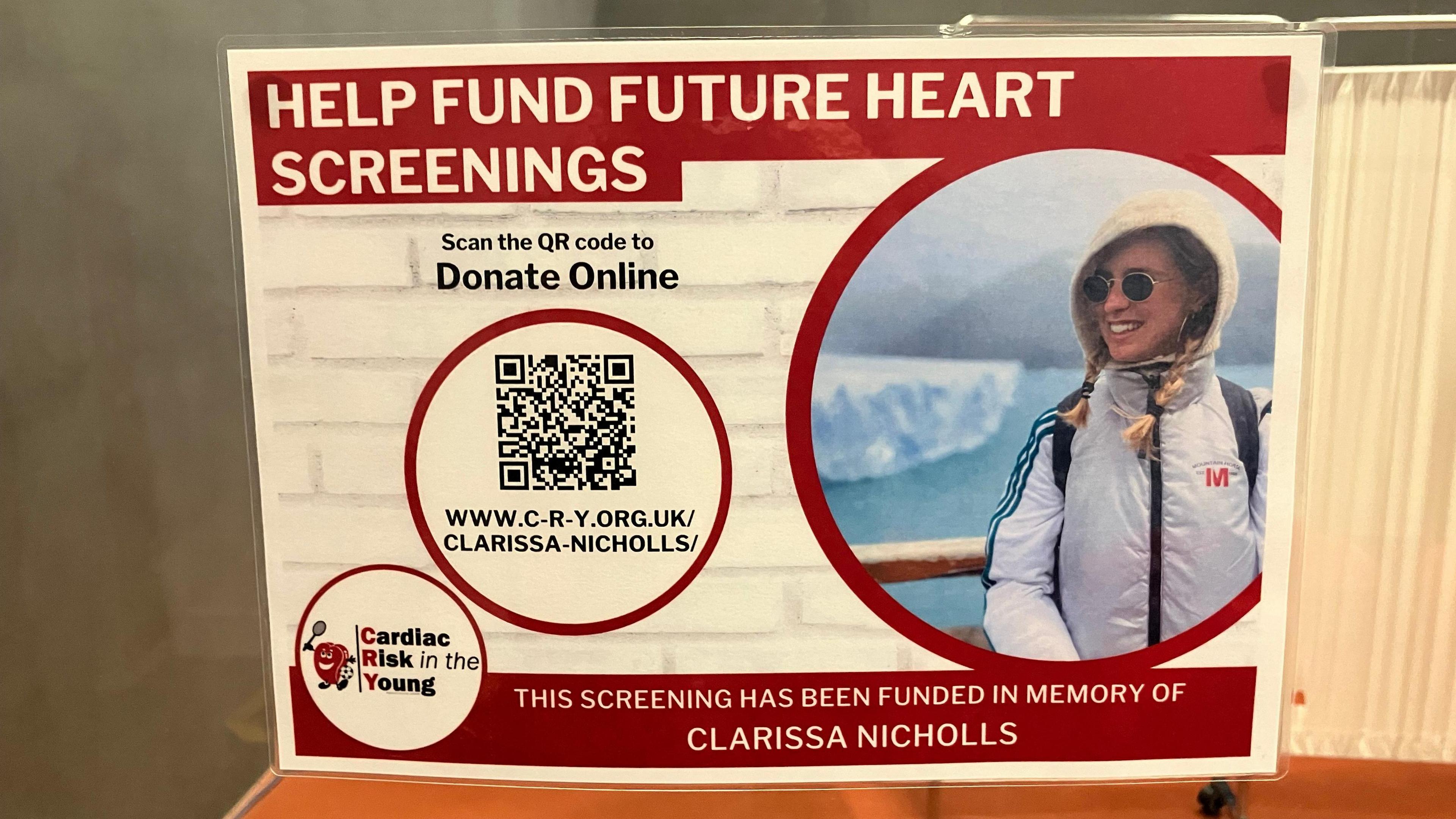 A red and cream poster, containing a photograph of Clarissa Nicholls, inviting people to "help fund future heart screenings"